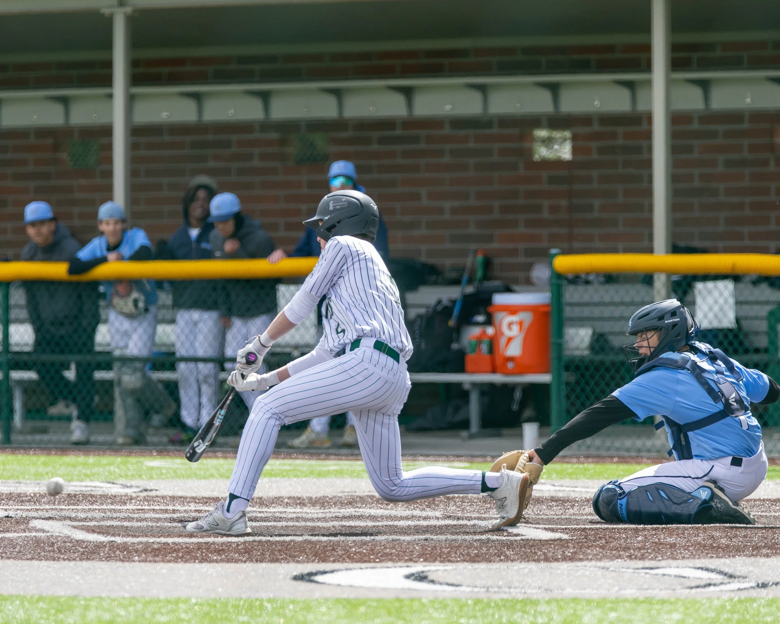 Kettering #5 hits a ground ball