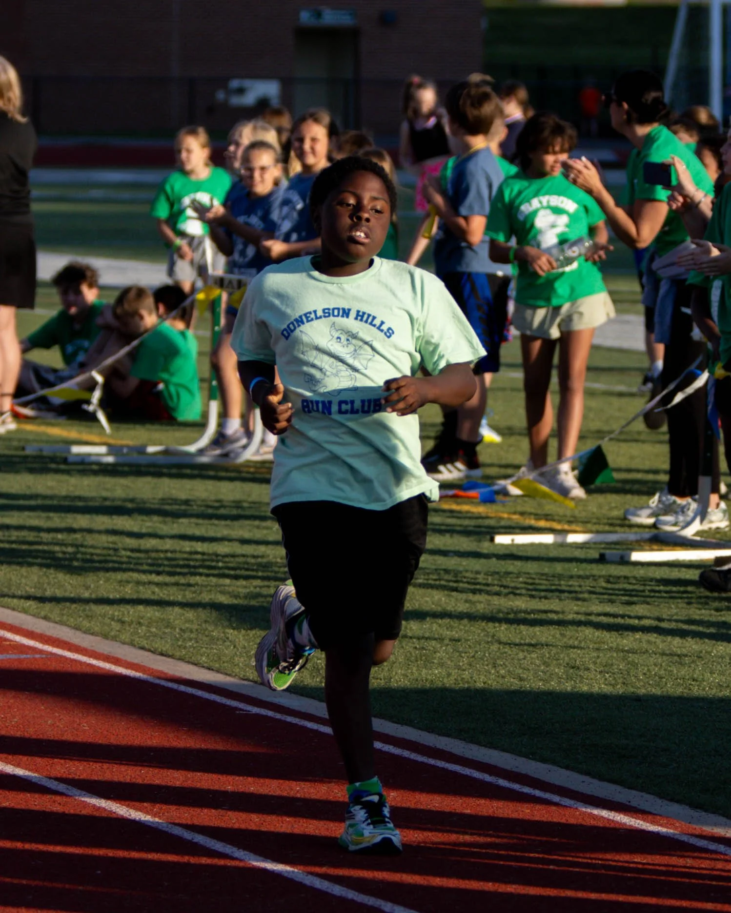 Donelson Hills runner at the finish line