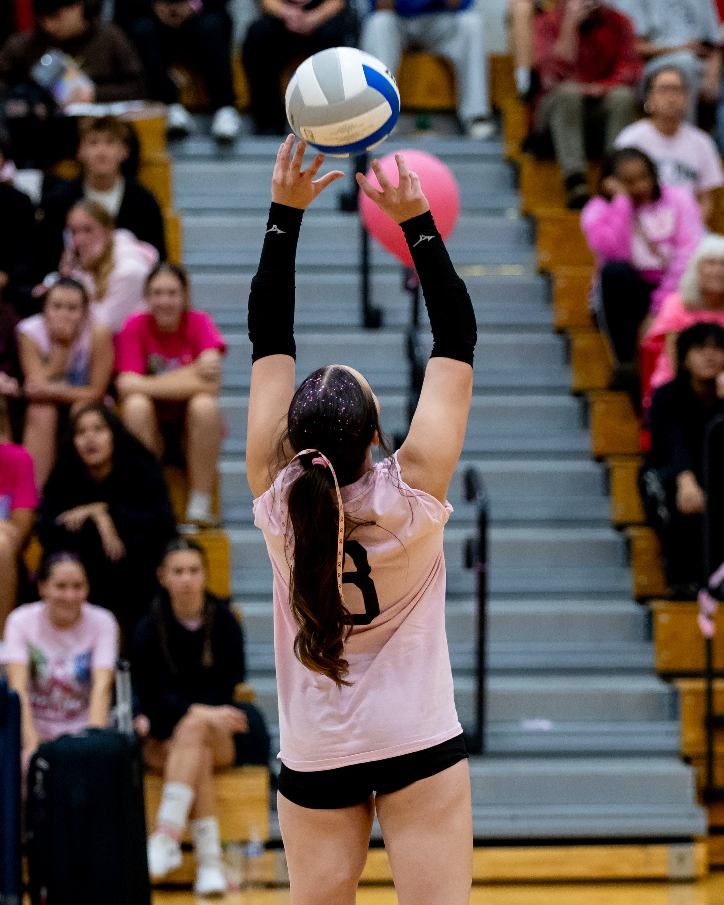 Mott player sets the ball