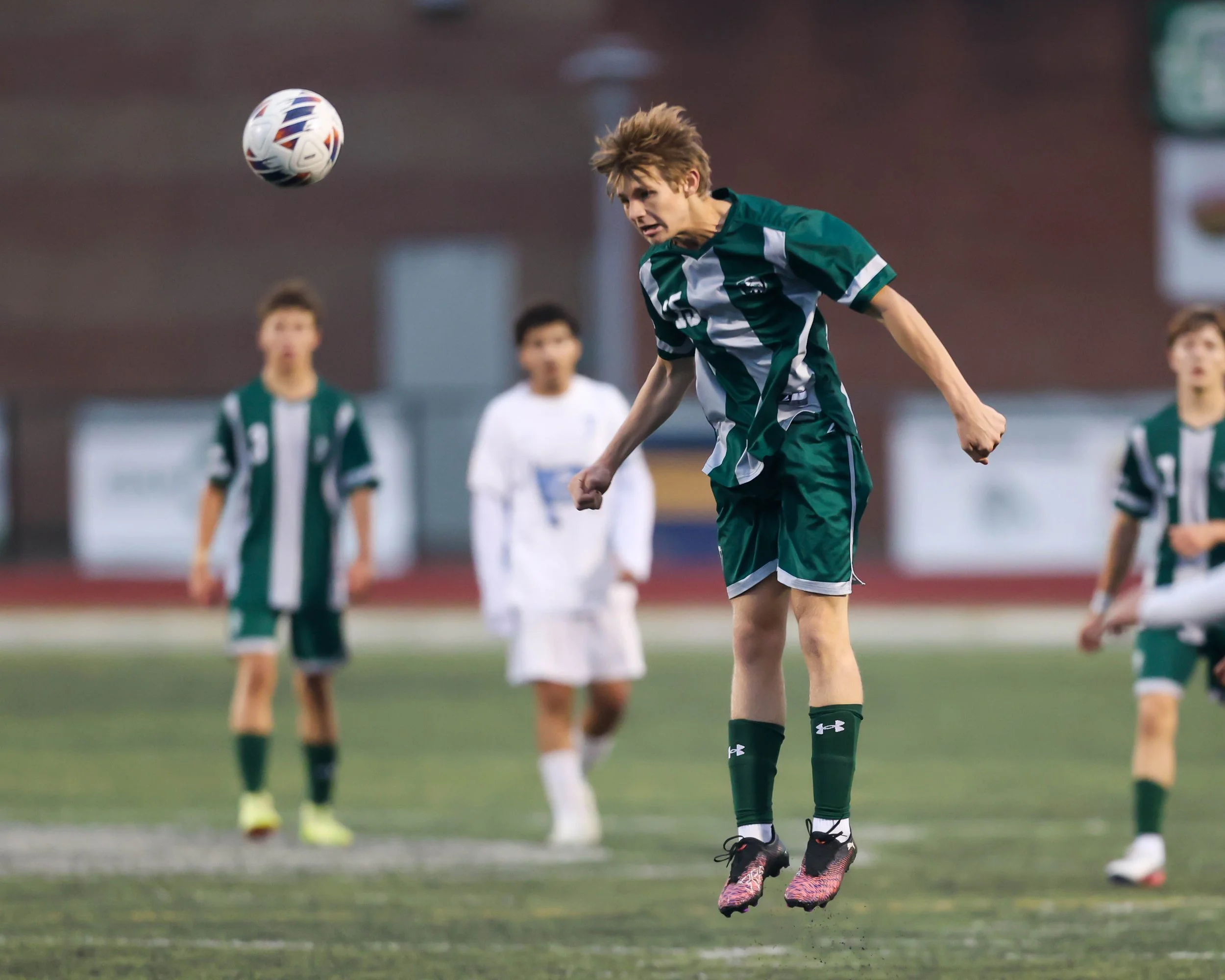 WK player heads the ball
