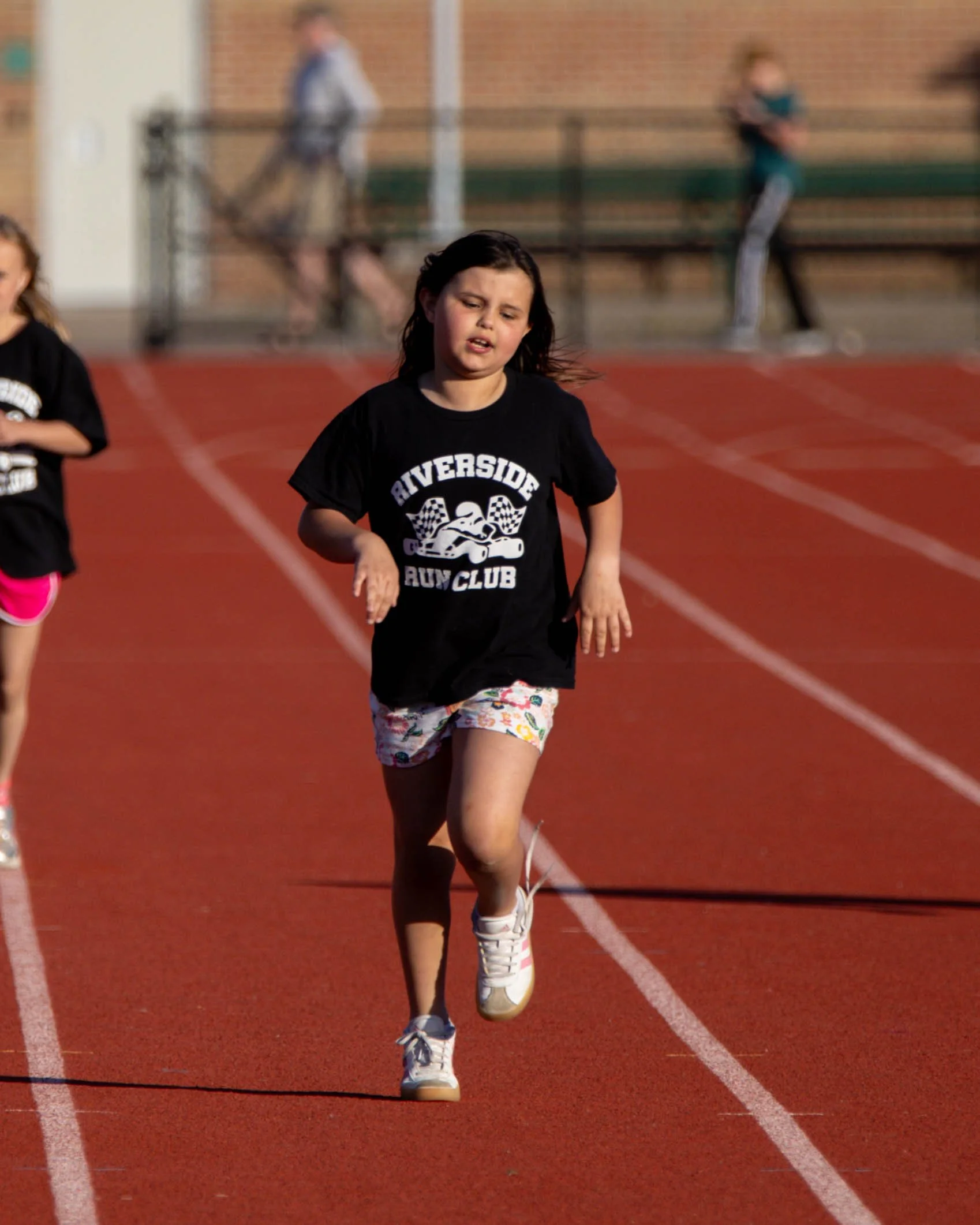 Riverside runner at the finish line