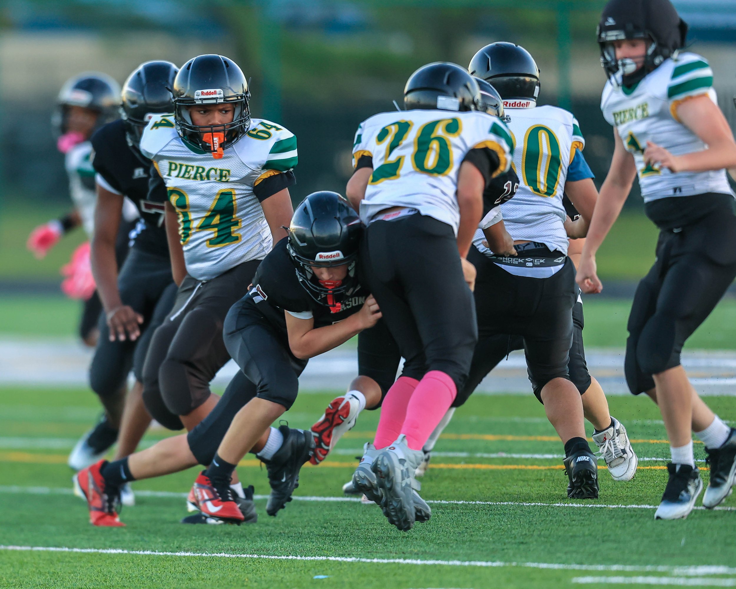 Pierce #26 tackled by Mason player