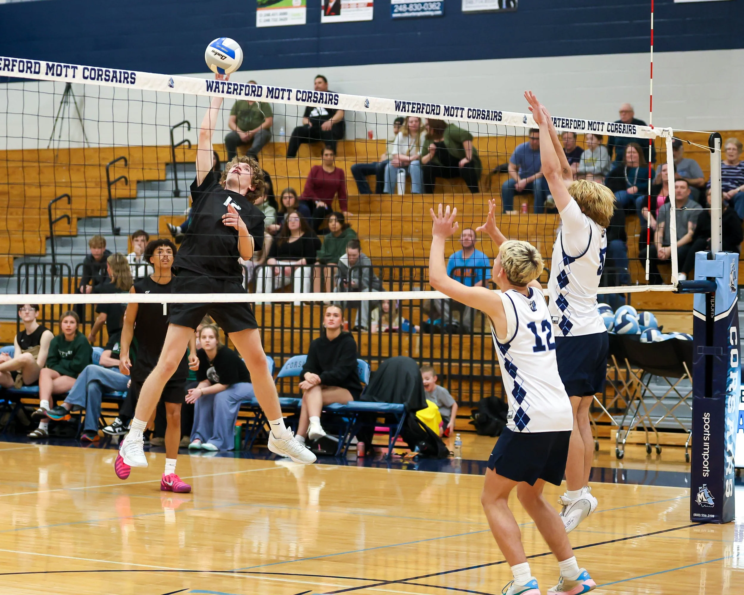 Kettering #12 spikes the ball