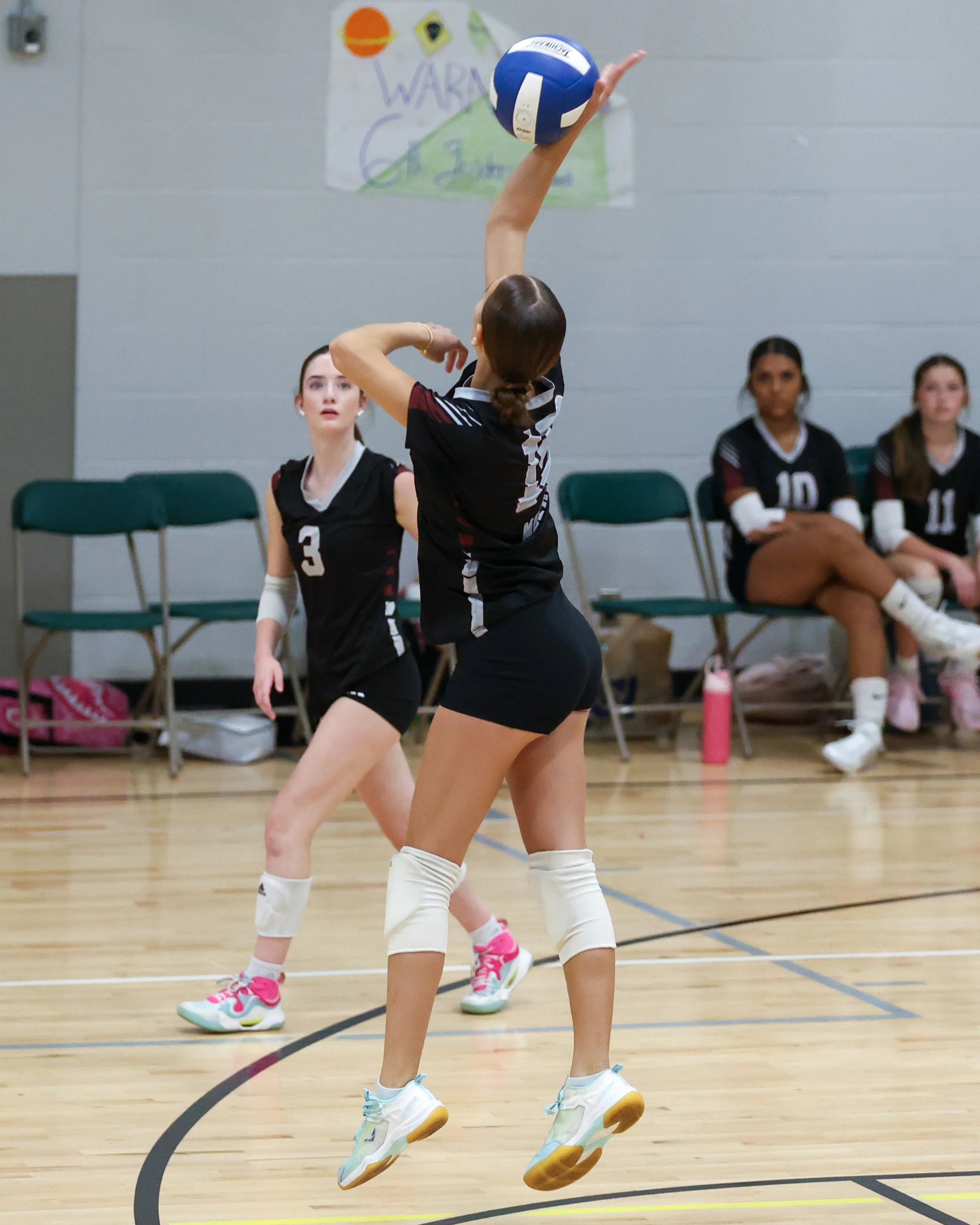Mason girl returns the ball