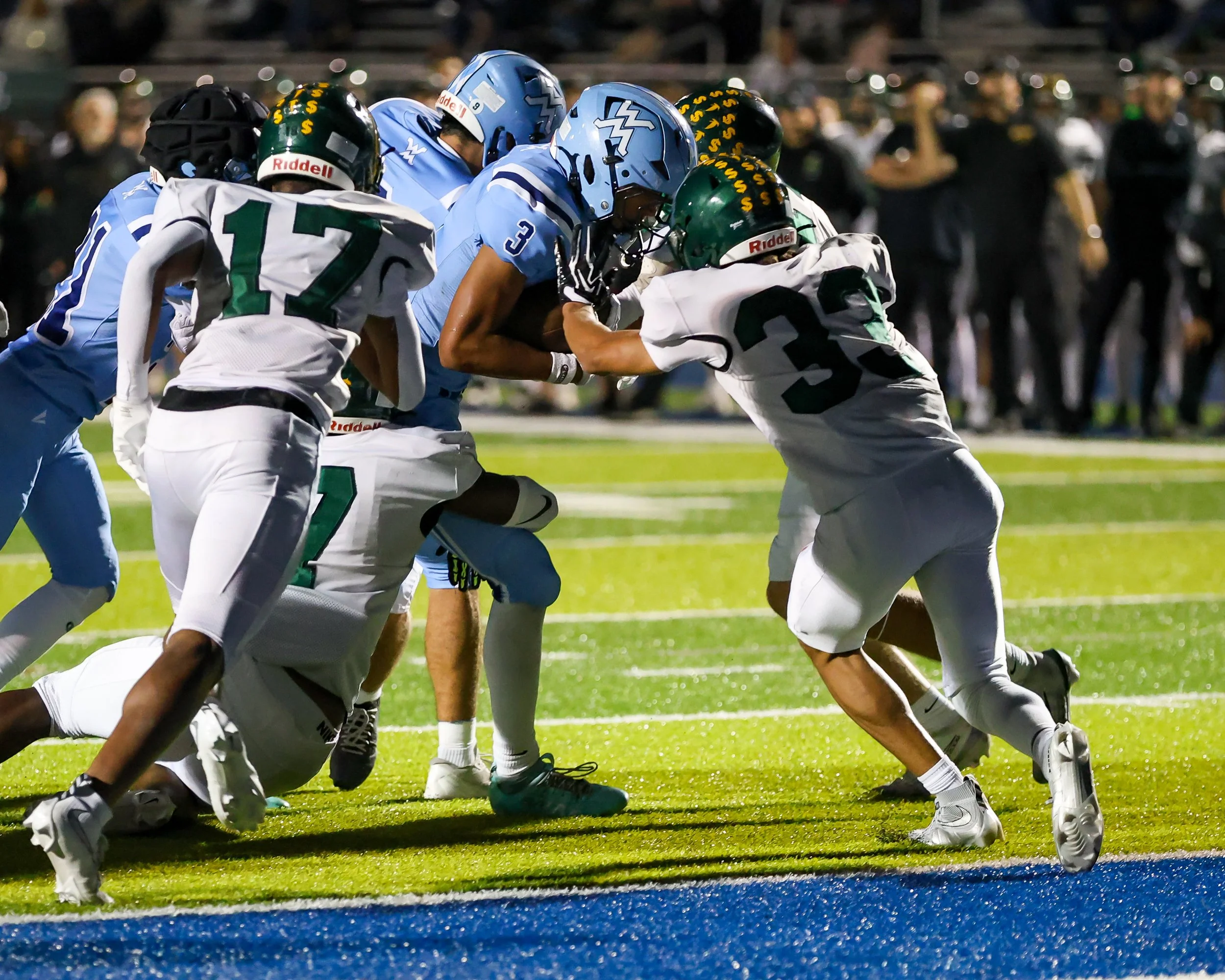 Mott #3 runs with the the ball