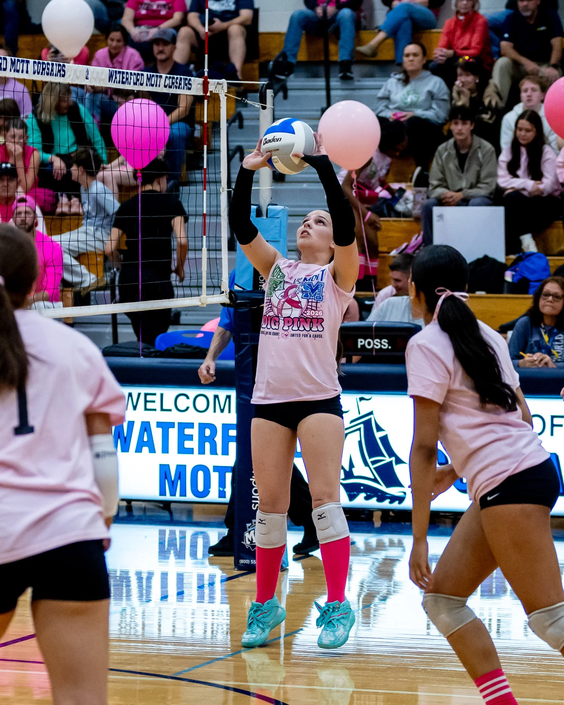 Mott player sets the ball