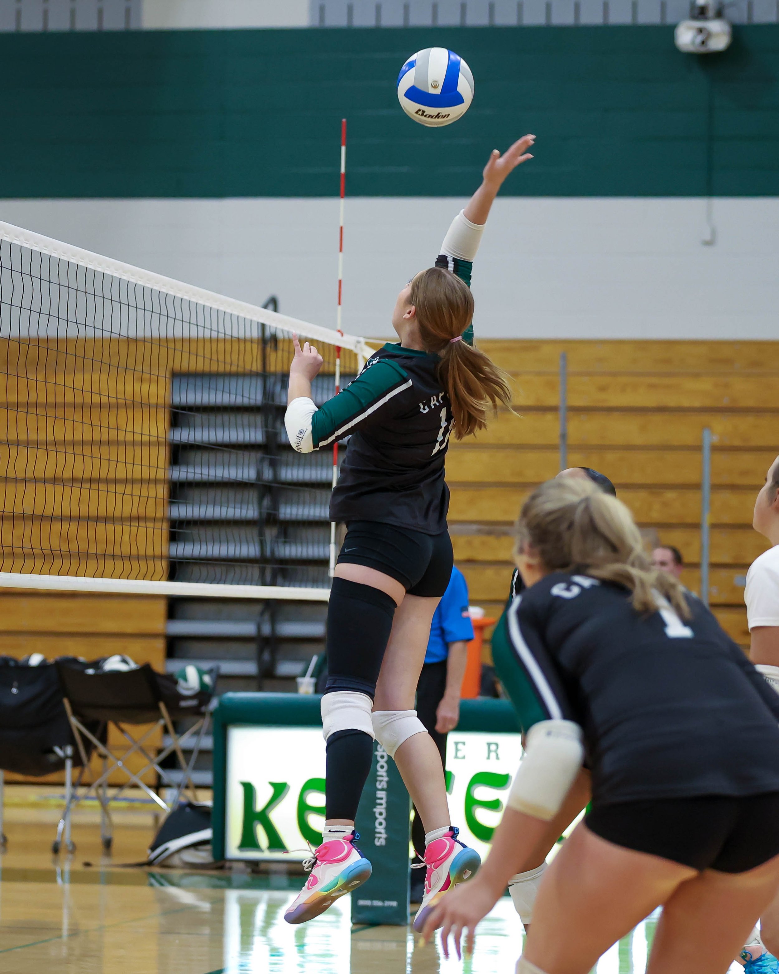 Kettering #11 hits the ball