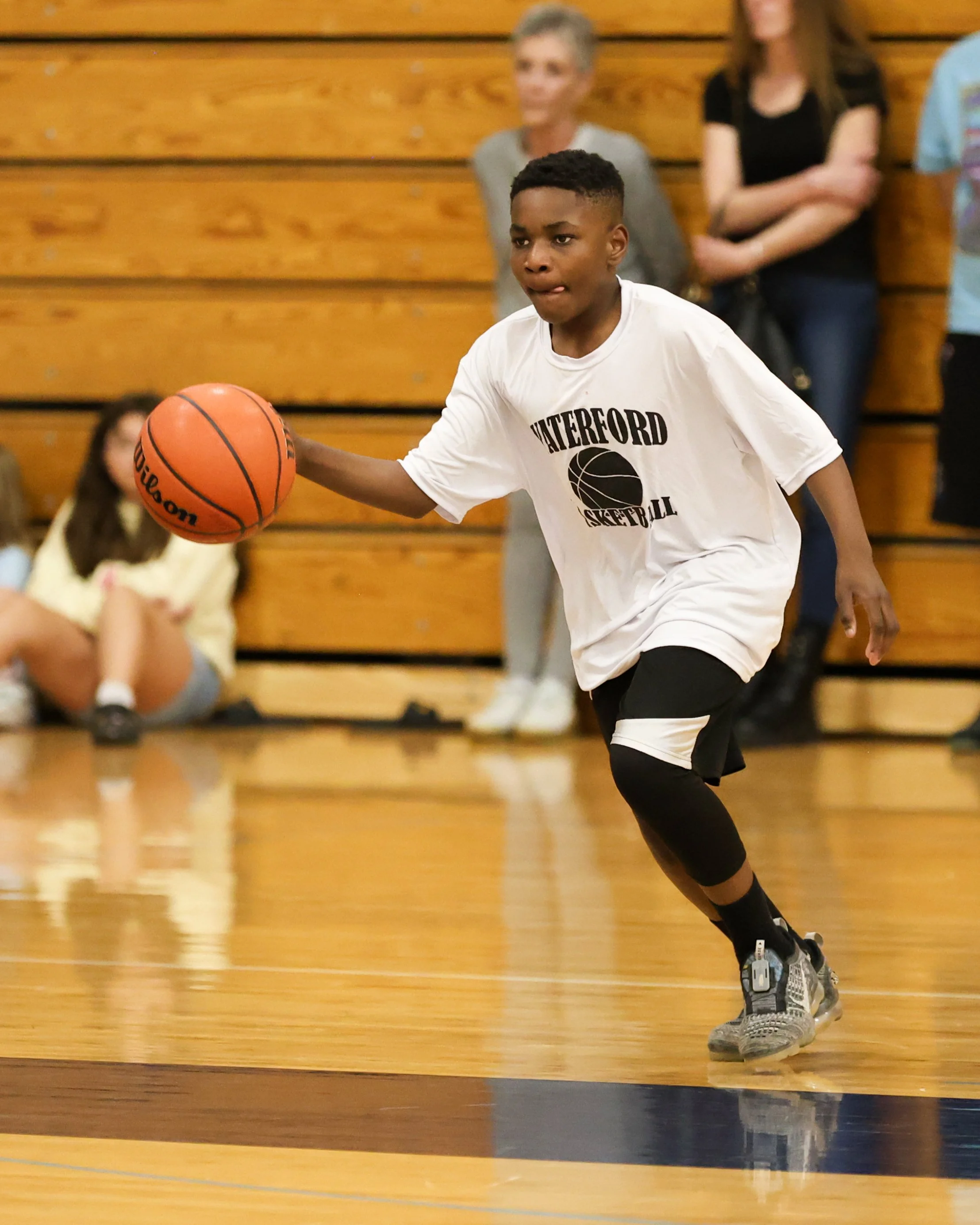 Beaumont boy dribbles the ball