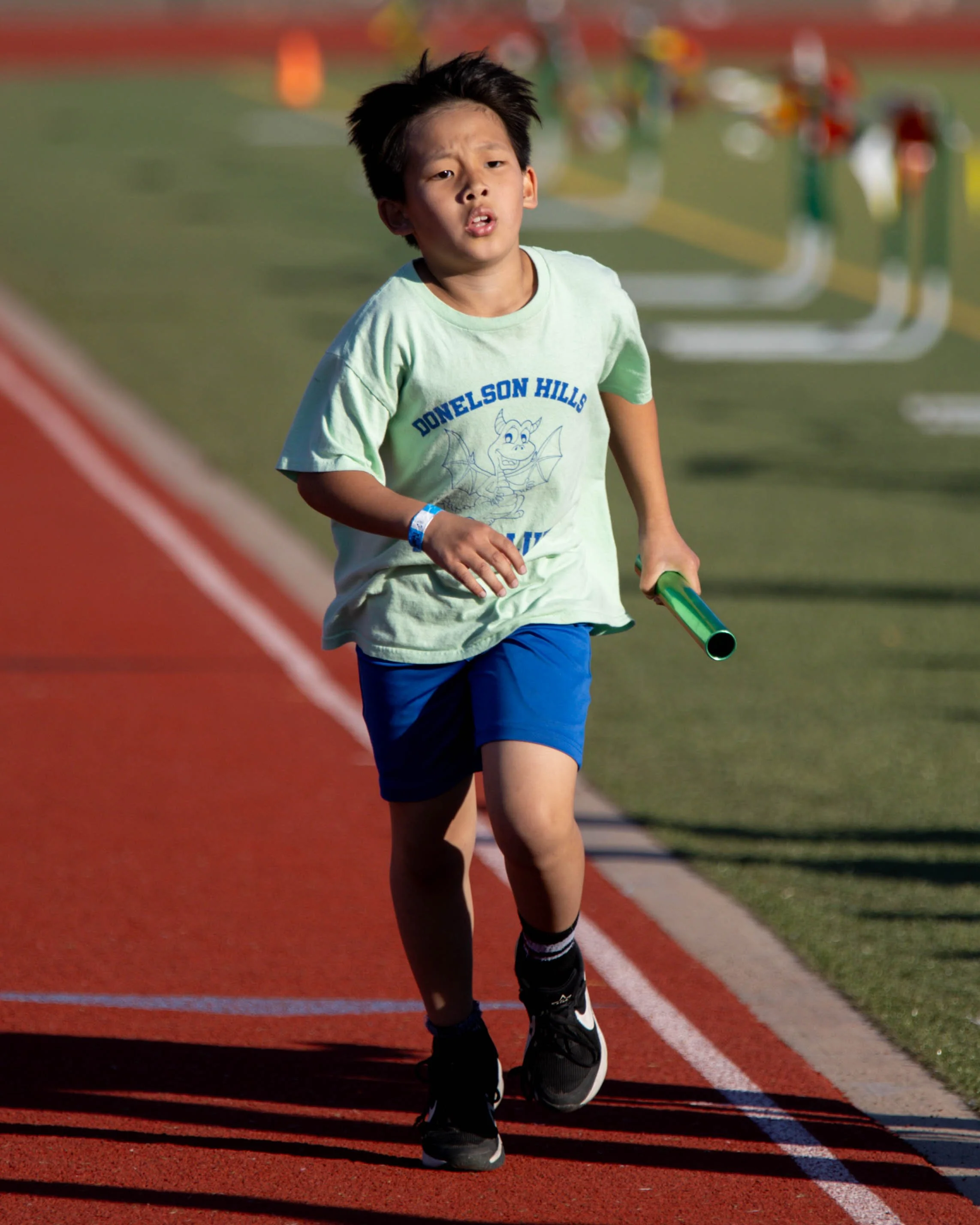 Donelson Hills runner at the finish line