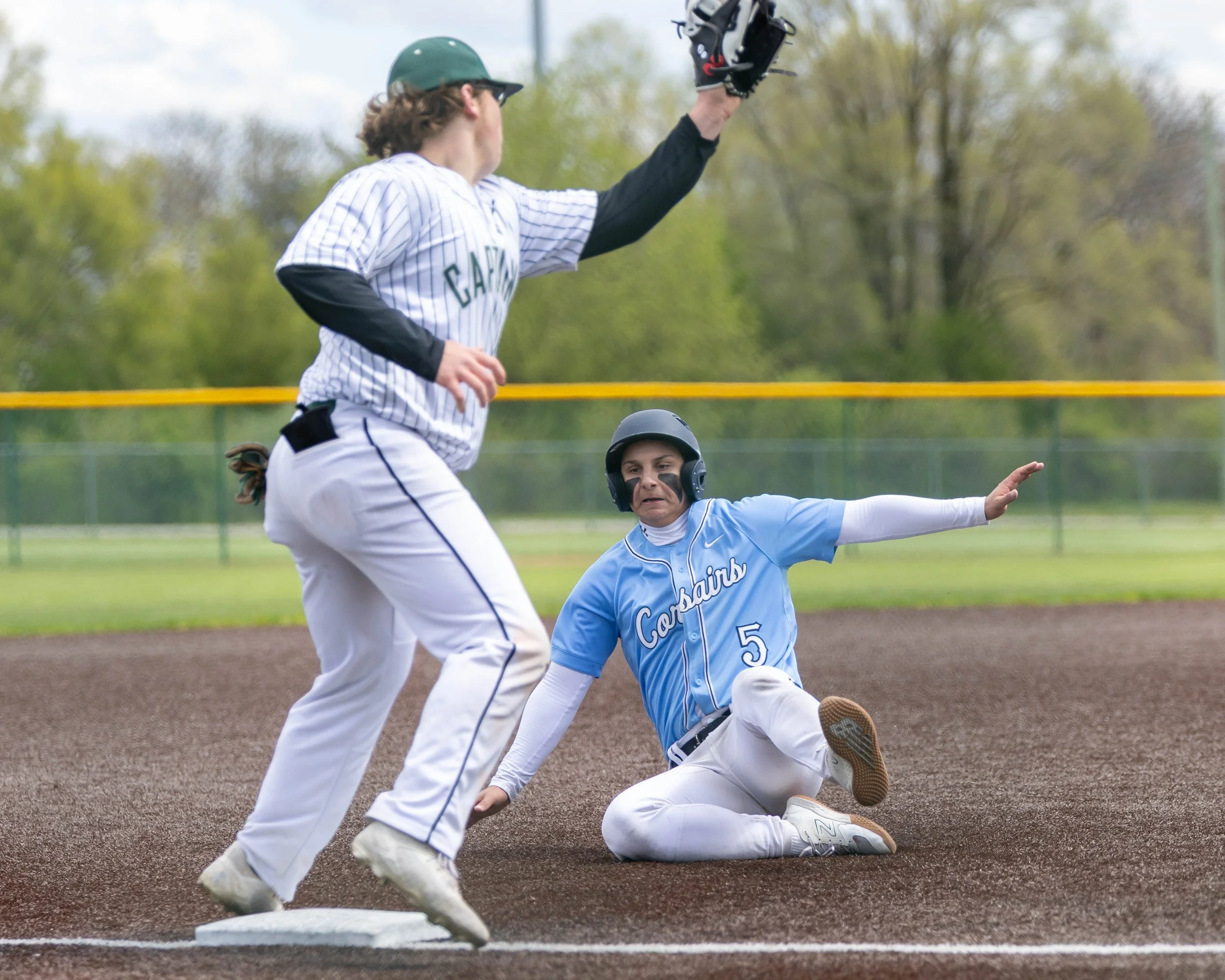 Mott #5 slides into 3rd base