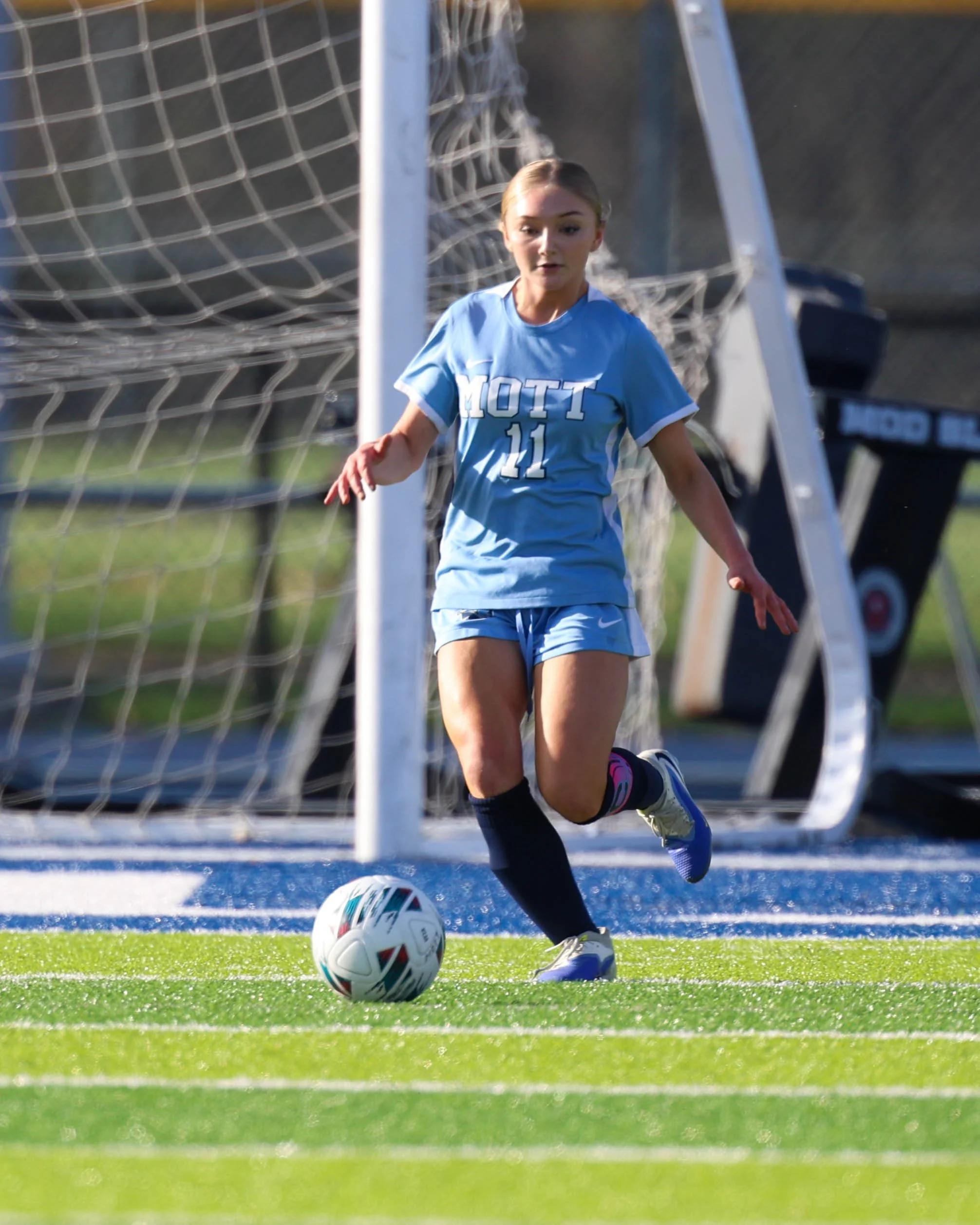 #11 dribbles the ball