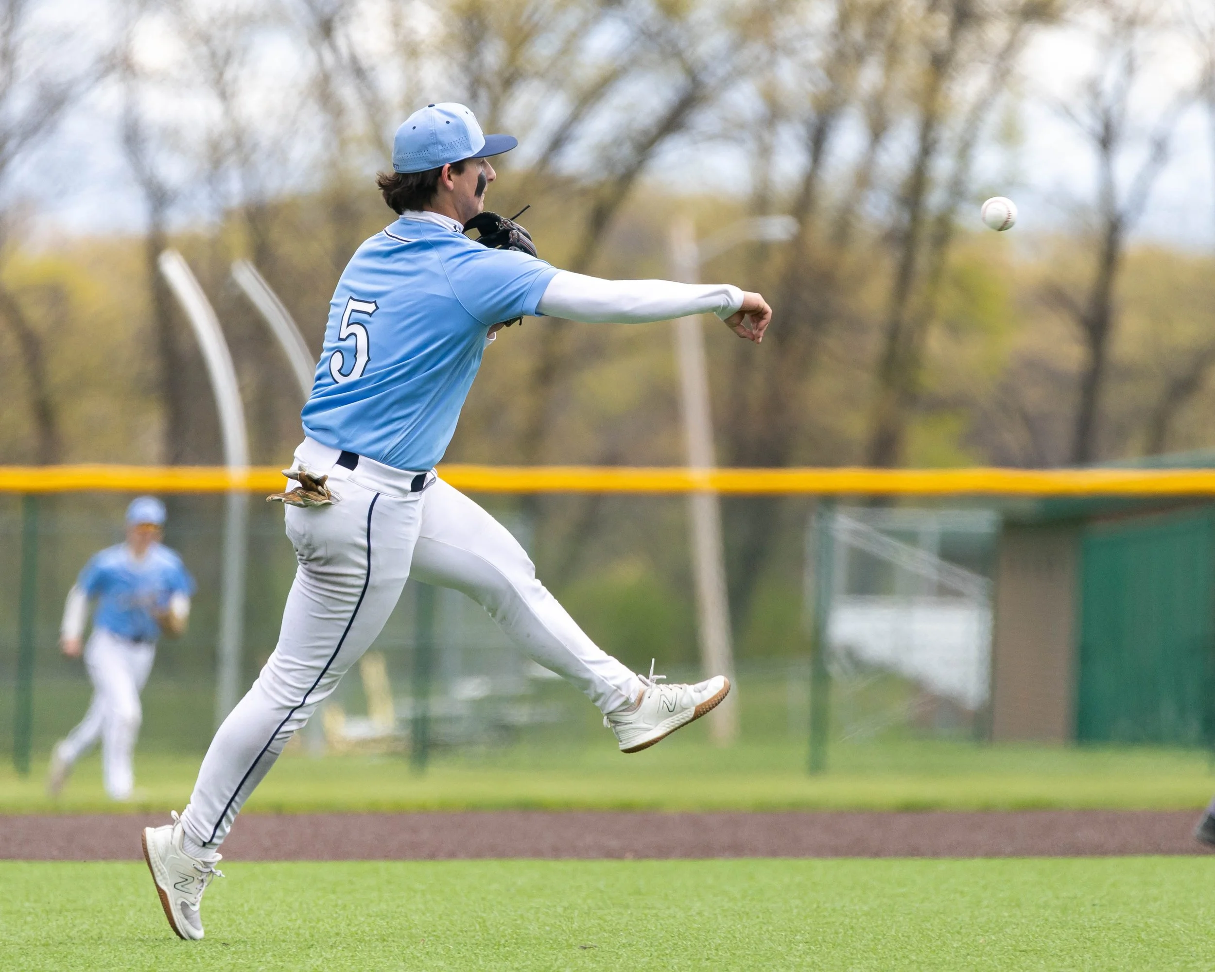 Mott #5 throws to 1st base