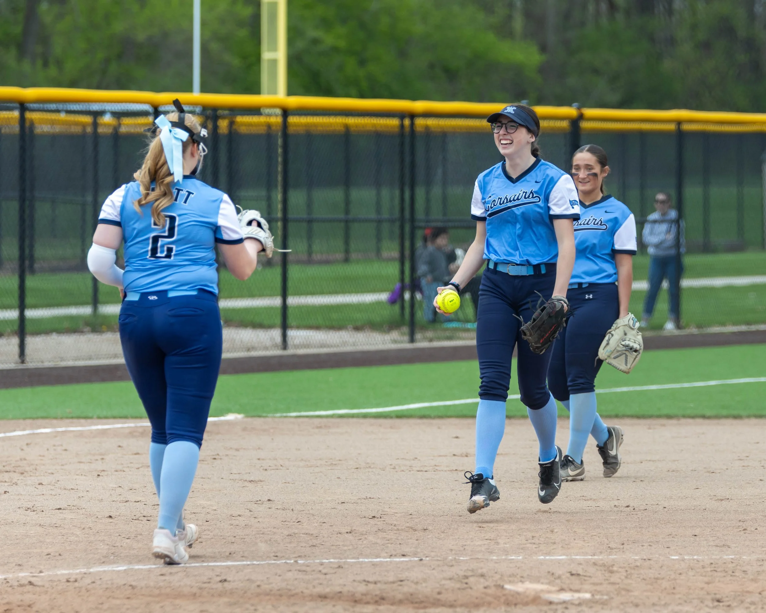 Mott player returns the ball to the pitcher
