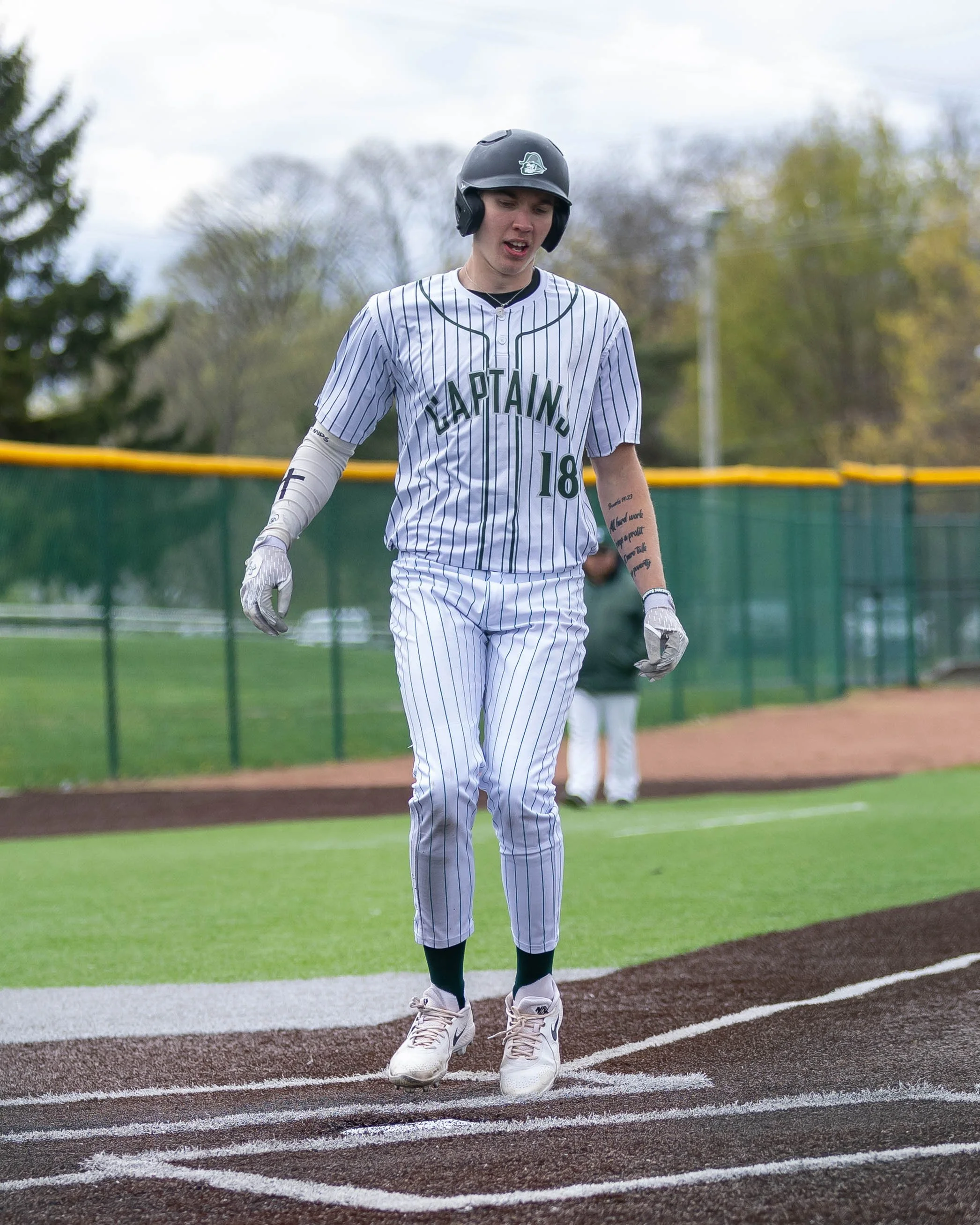 Kettering #18 scores a run