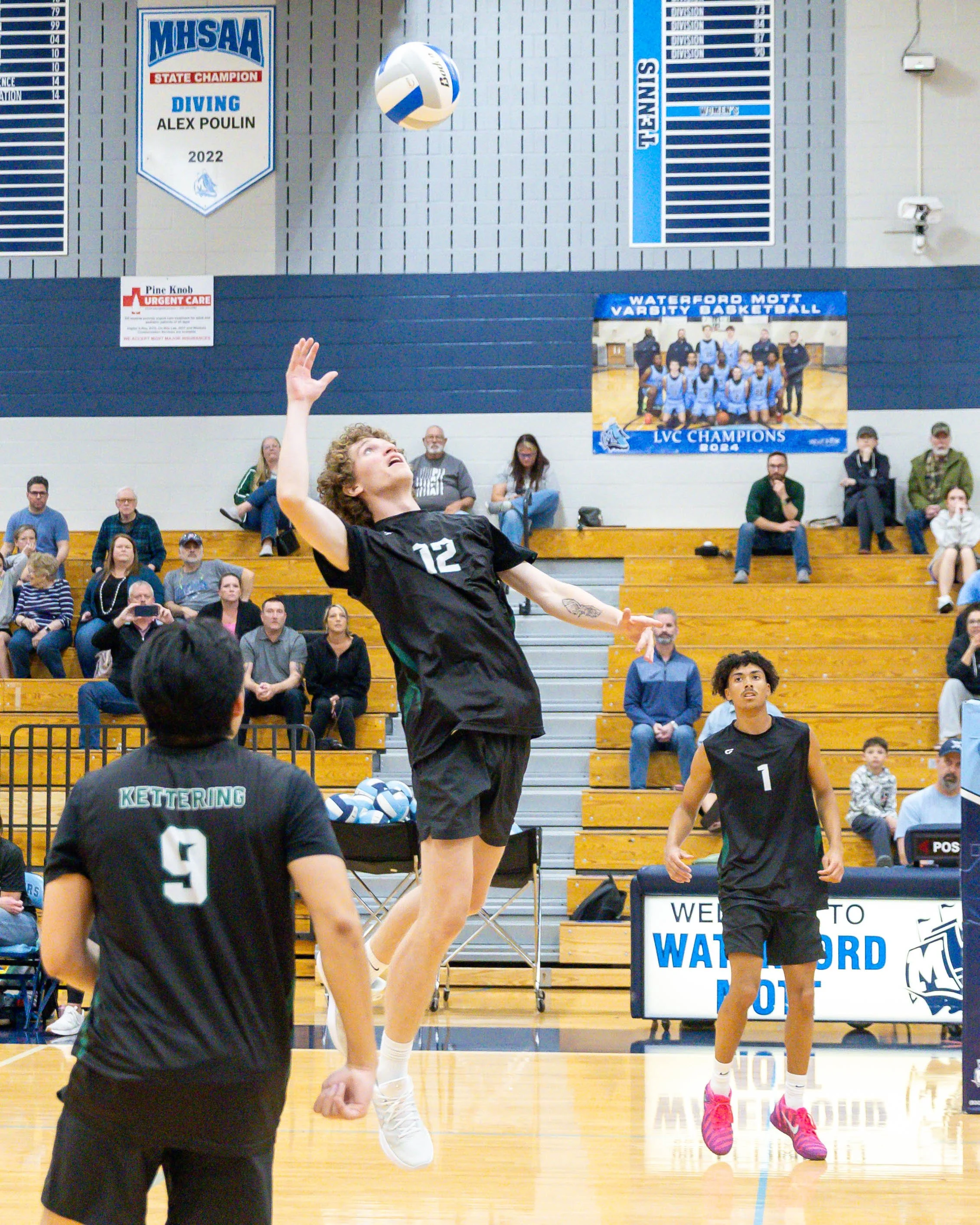 Kettering #12 spikes the ball