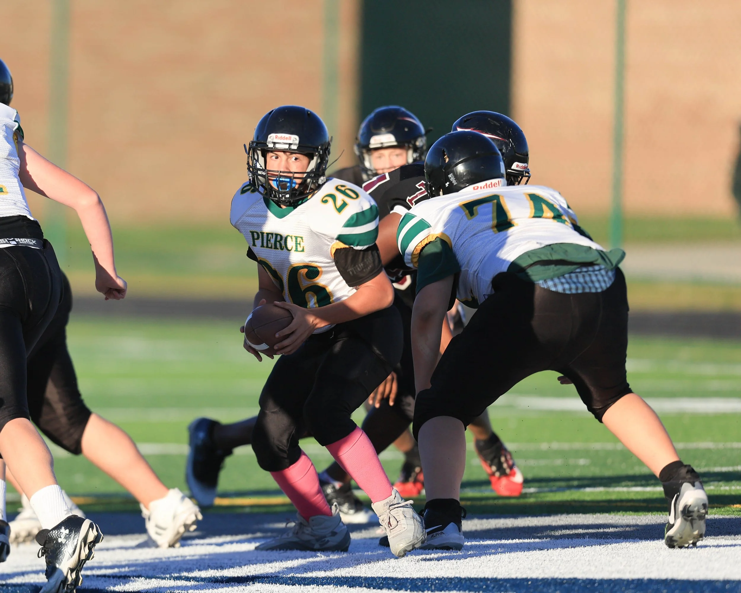 Pierce #26 with the ball