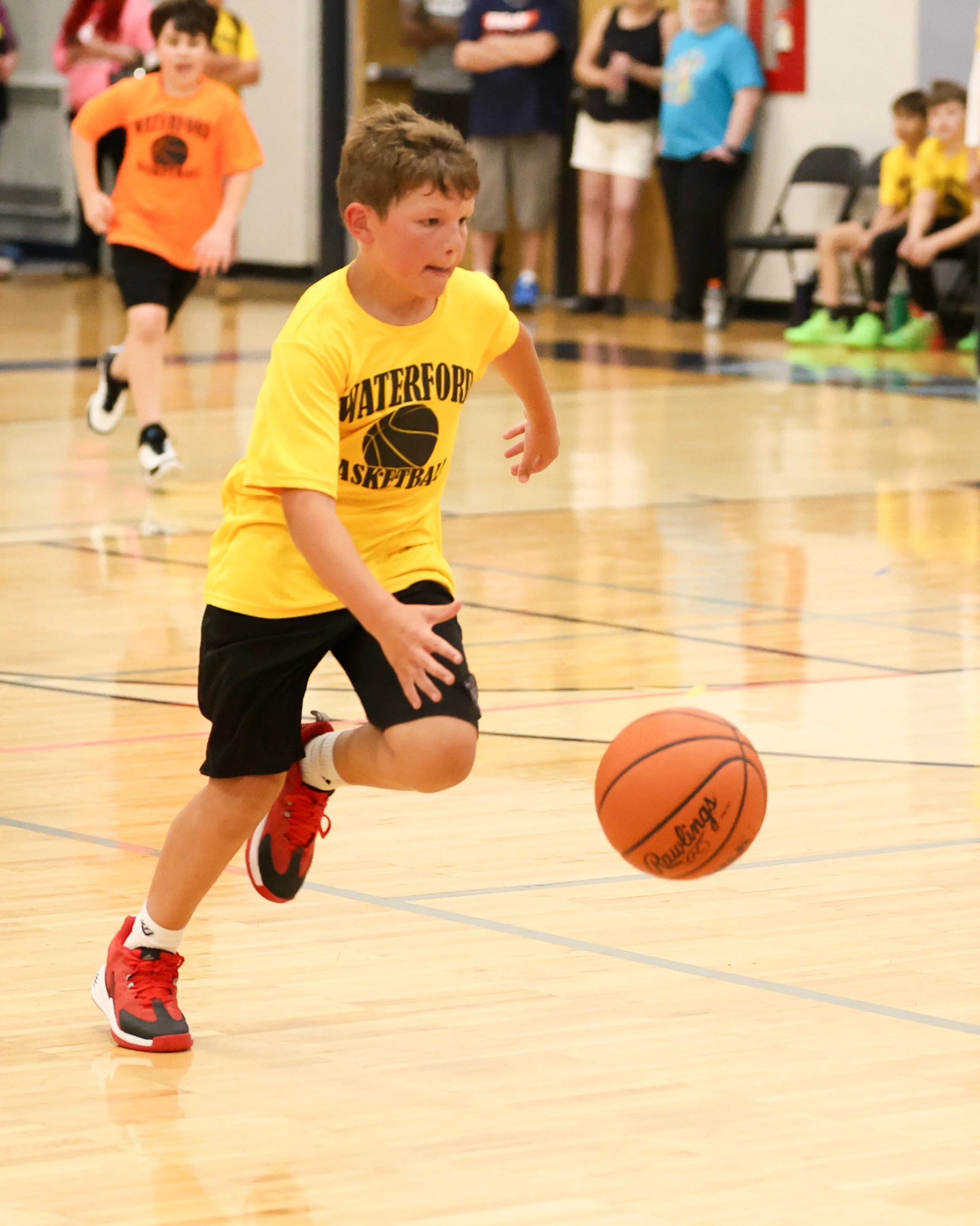 Schoolcraft boy dribbles the ball