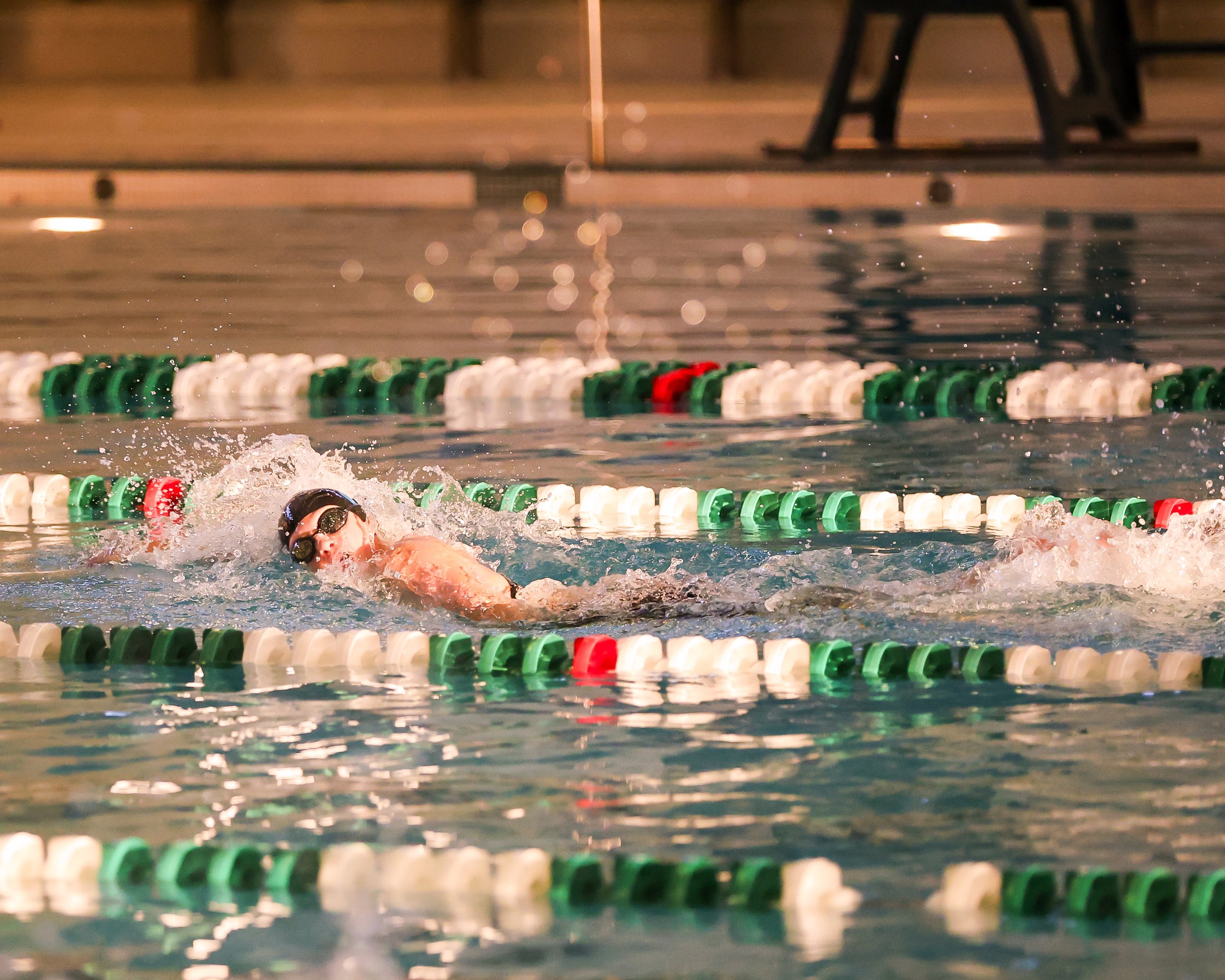 WU swimmer doing the backstroke