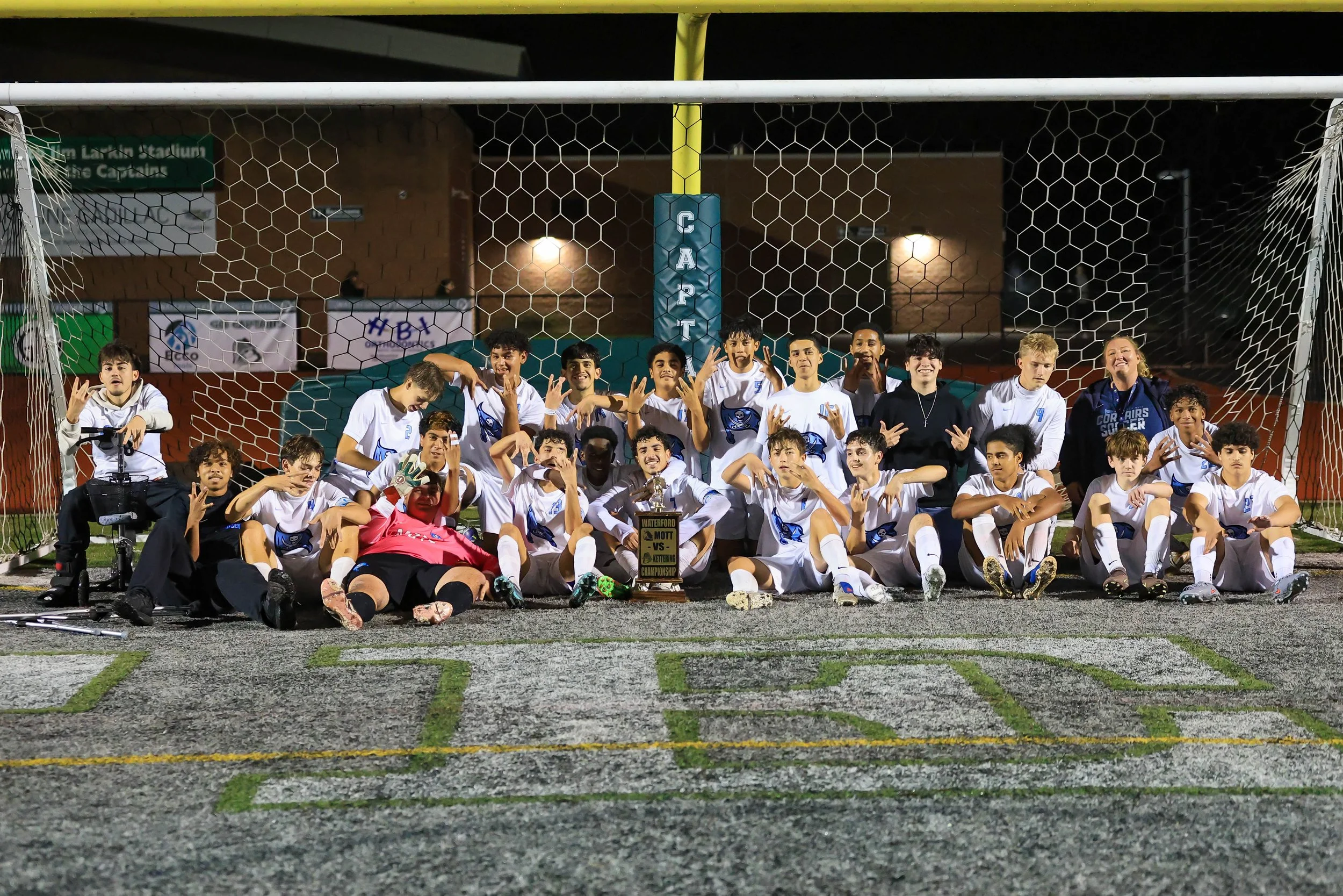 Mott team picture with the trophy