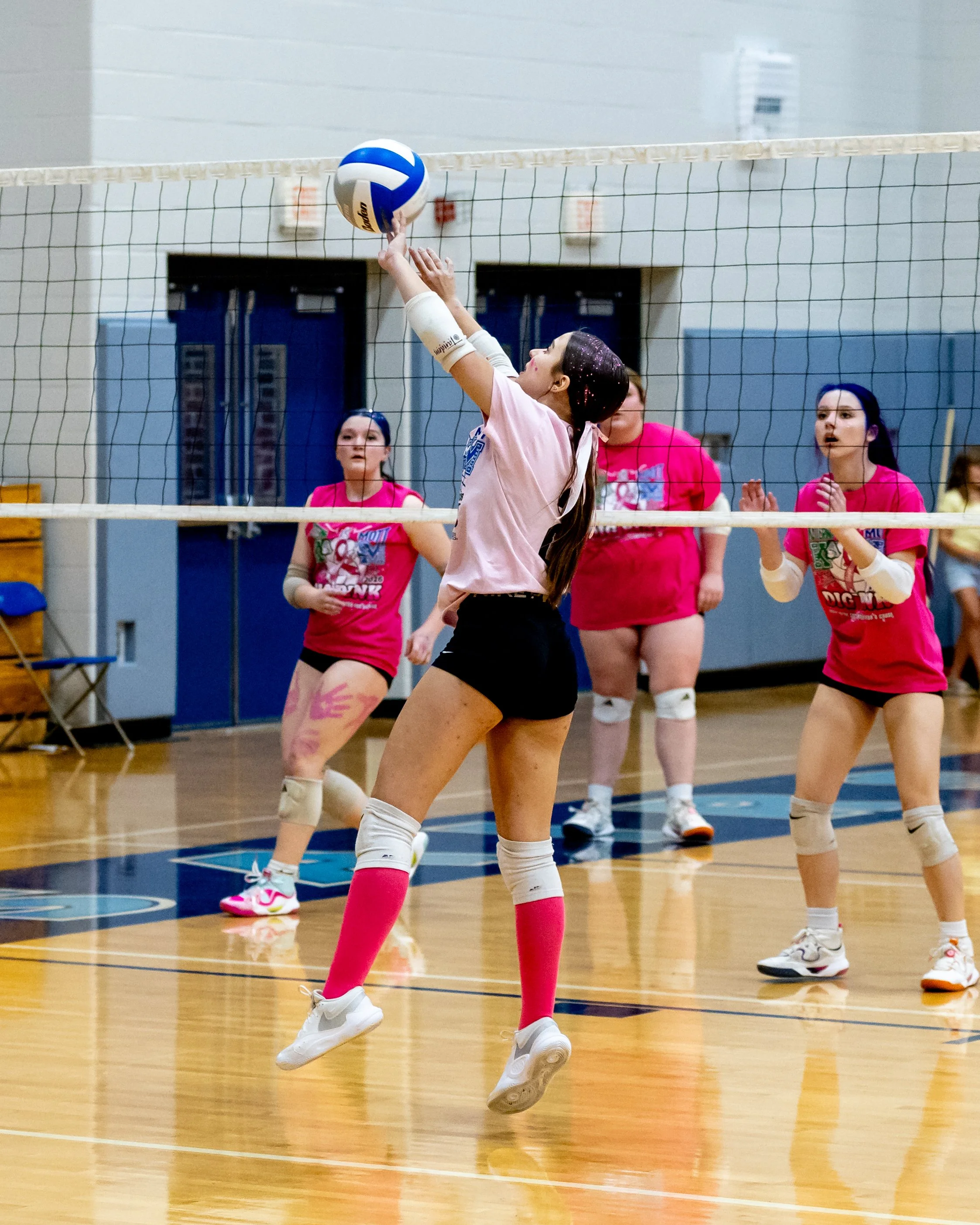 Mott player hits the ball