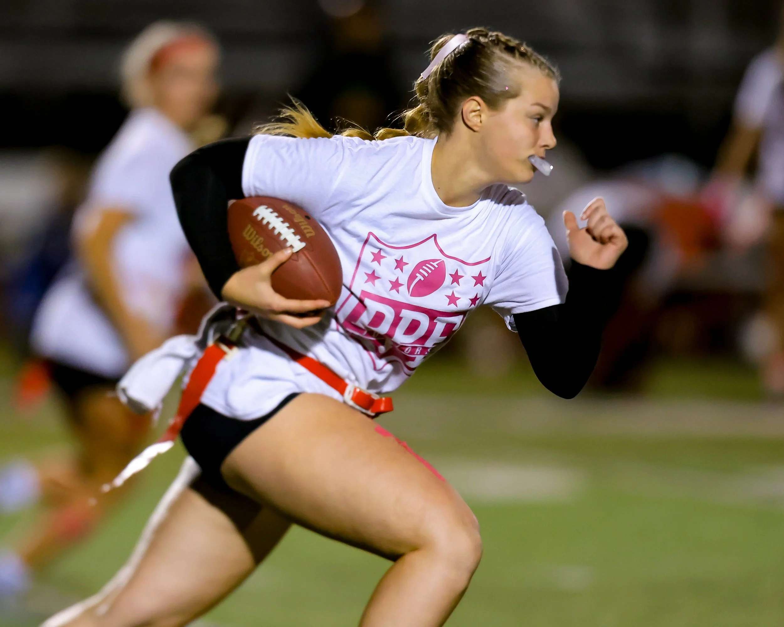 Junior quarterback runs with the ball