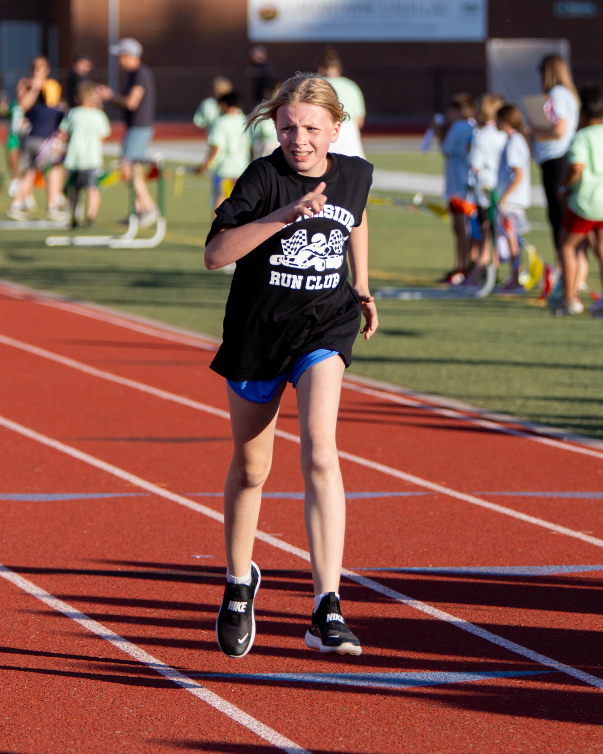 Riverside runner at the finish line