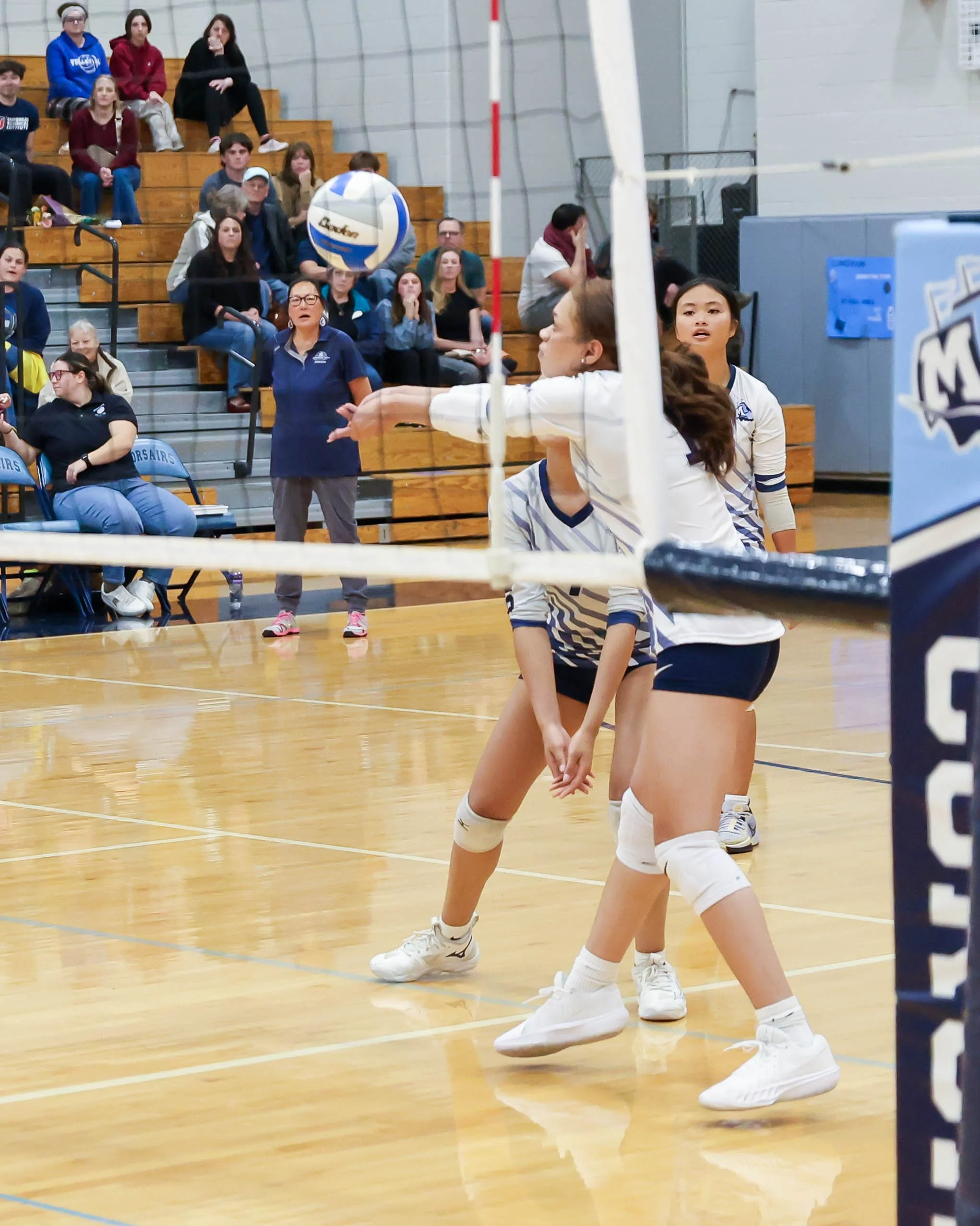 Mott #1 returns the serve
