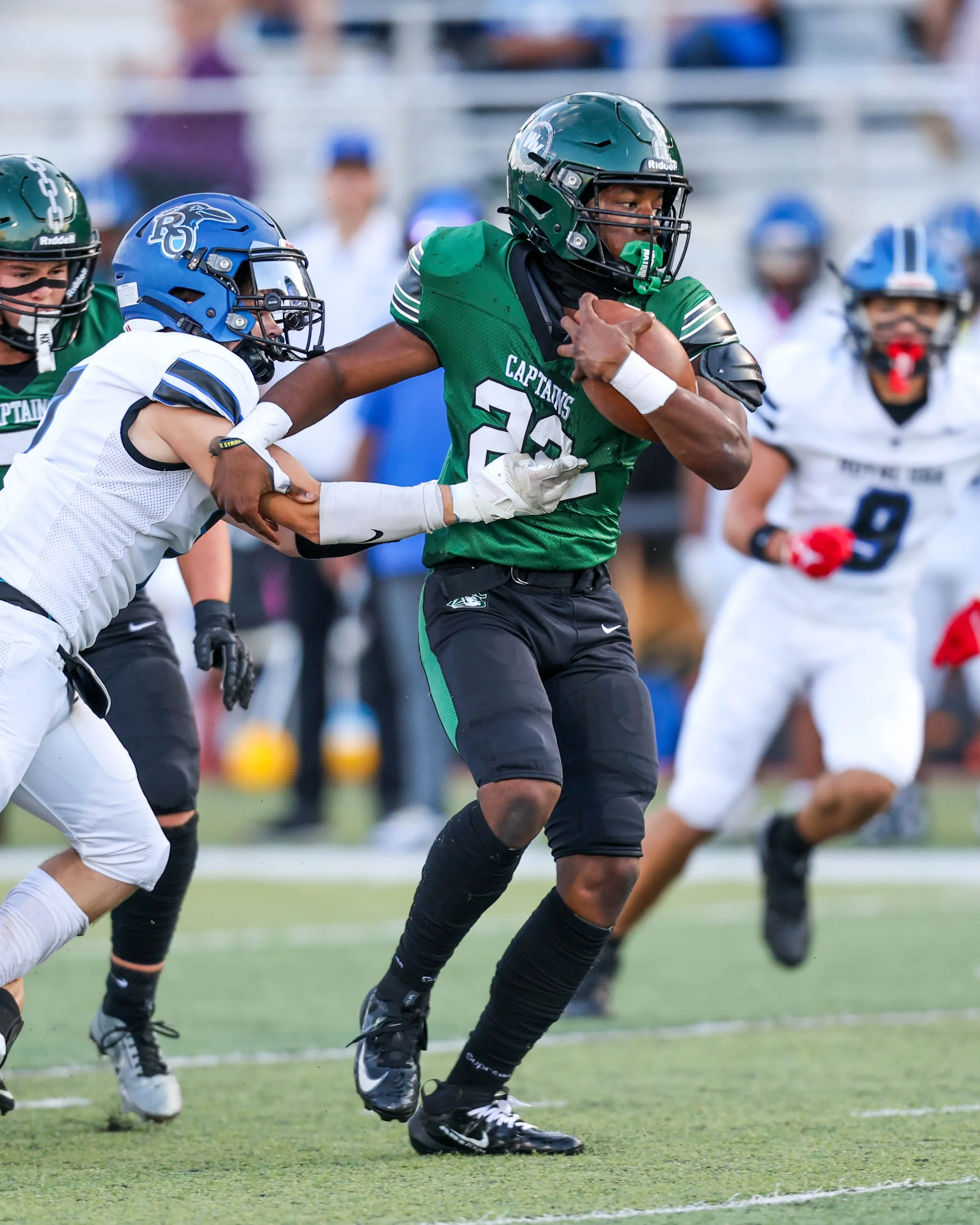 WK #22 breaks through a tackle