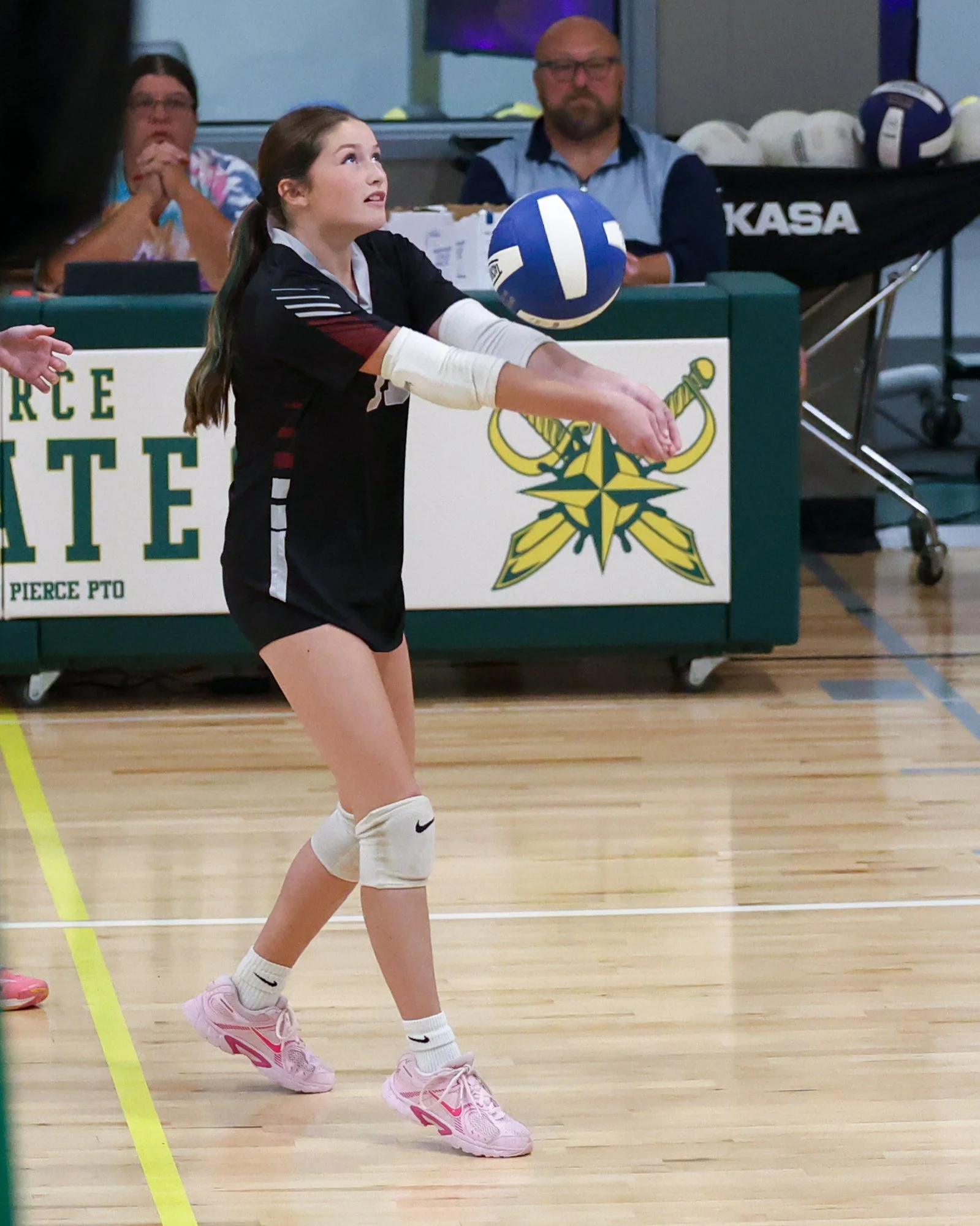 Mason girl returns the ball