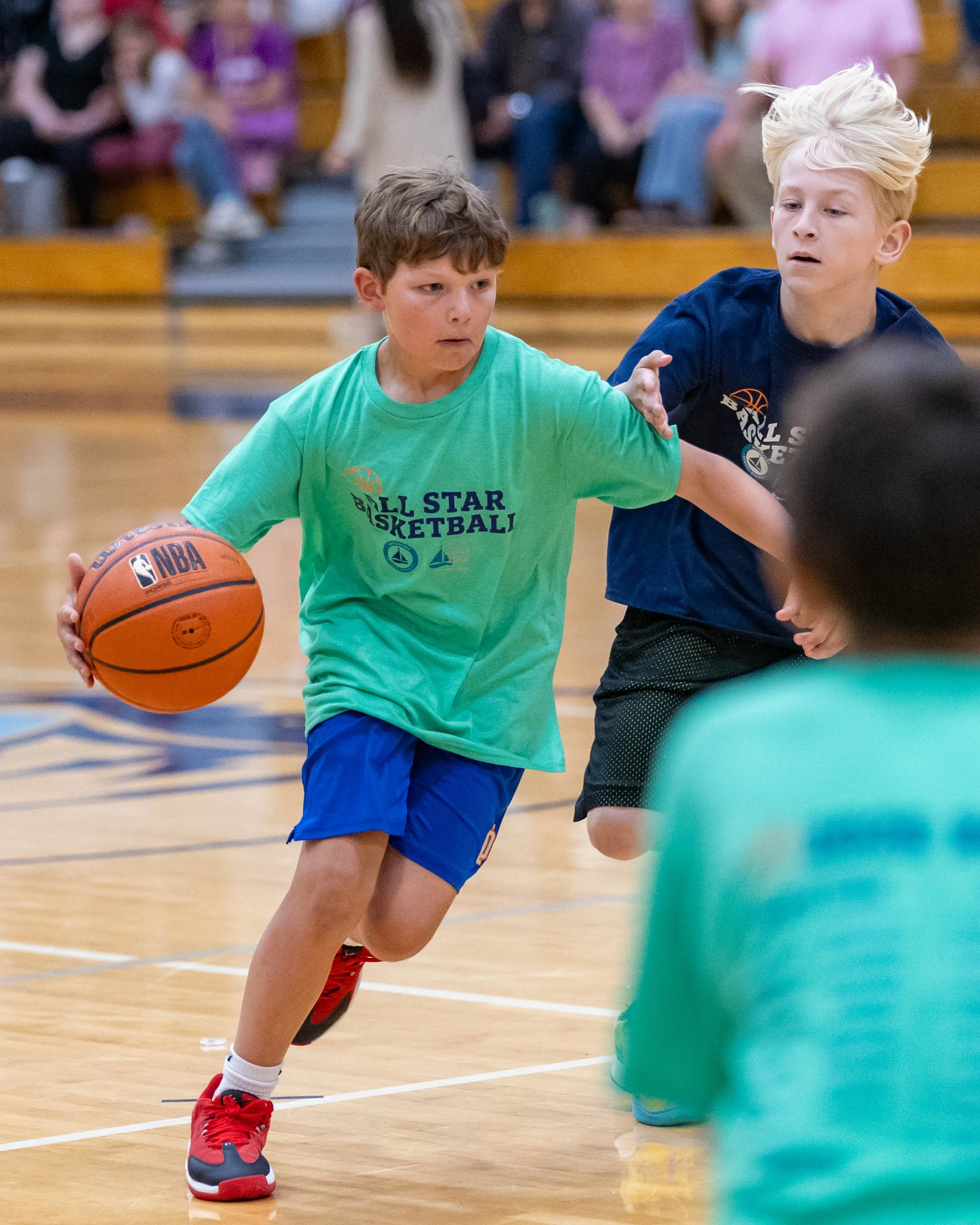 South boy dribbles the ball