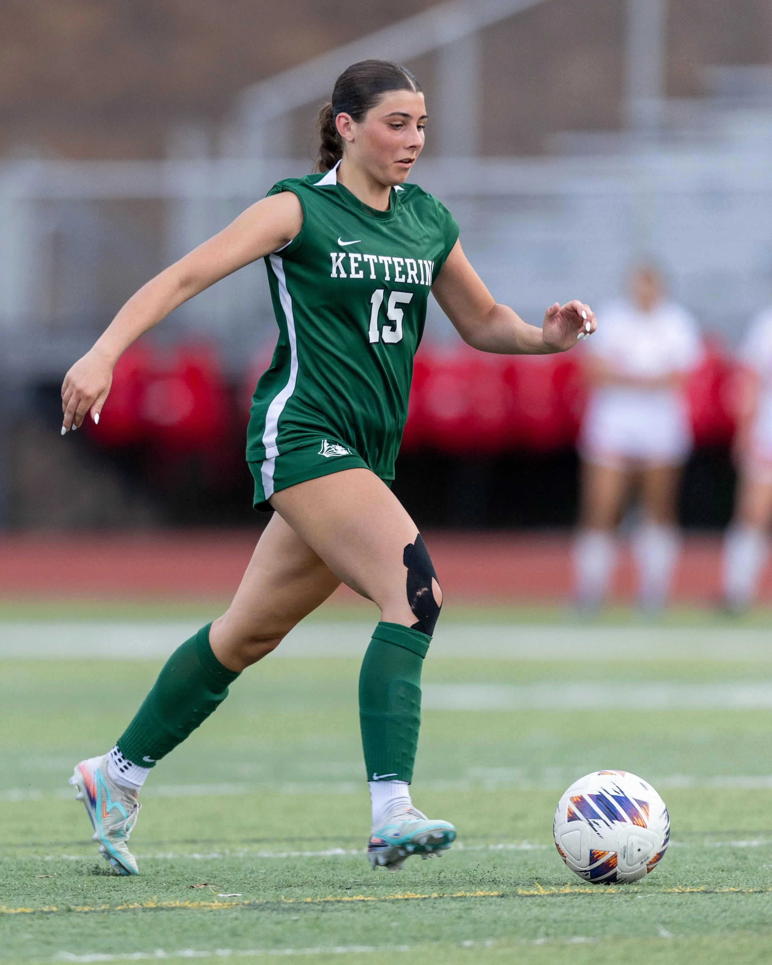 #15 dribbles the ball