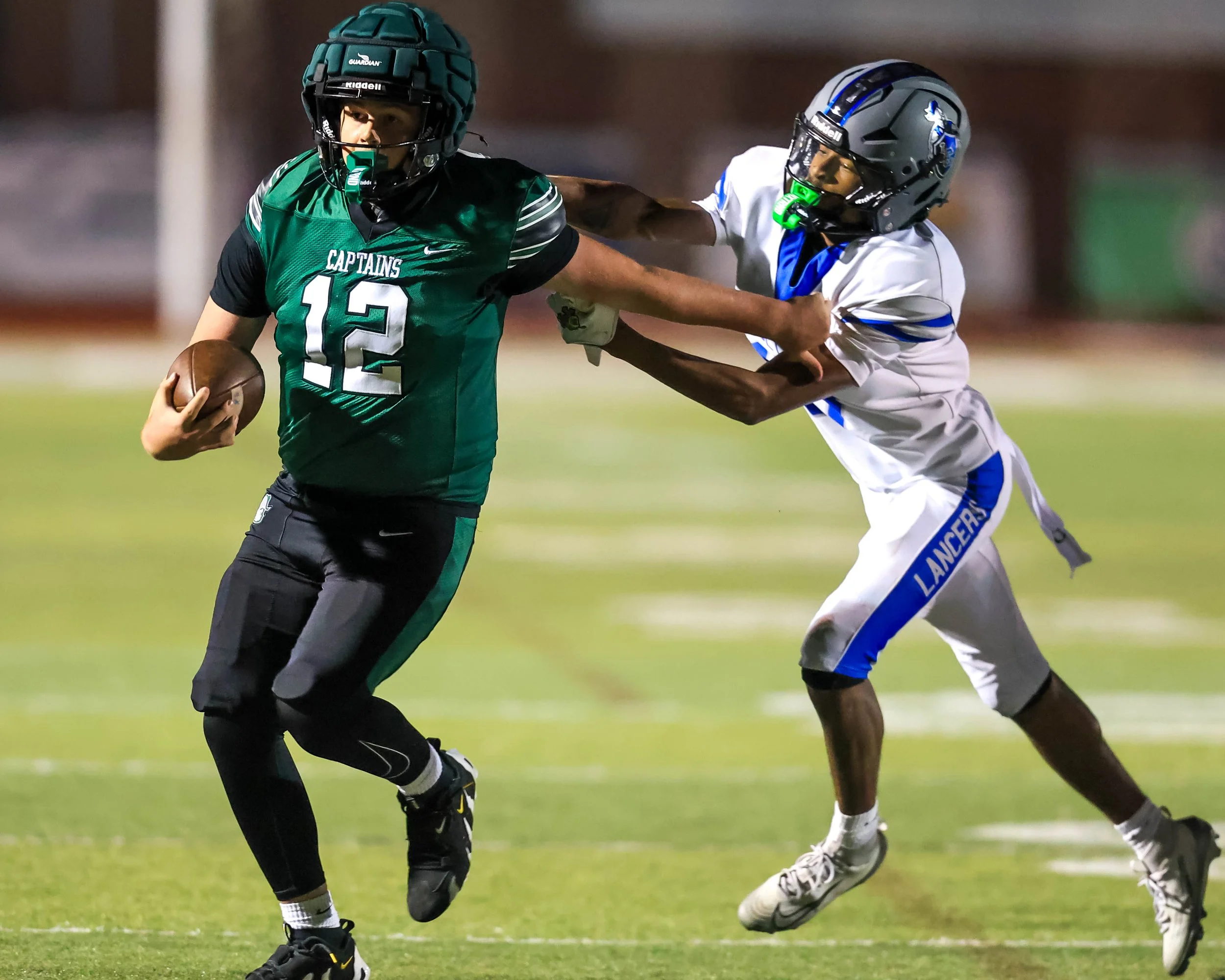 WK #12 carries the ball