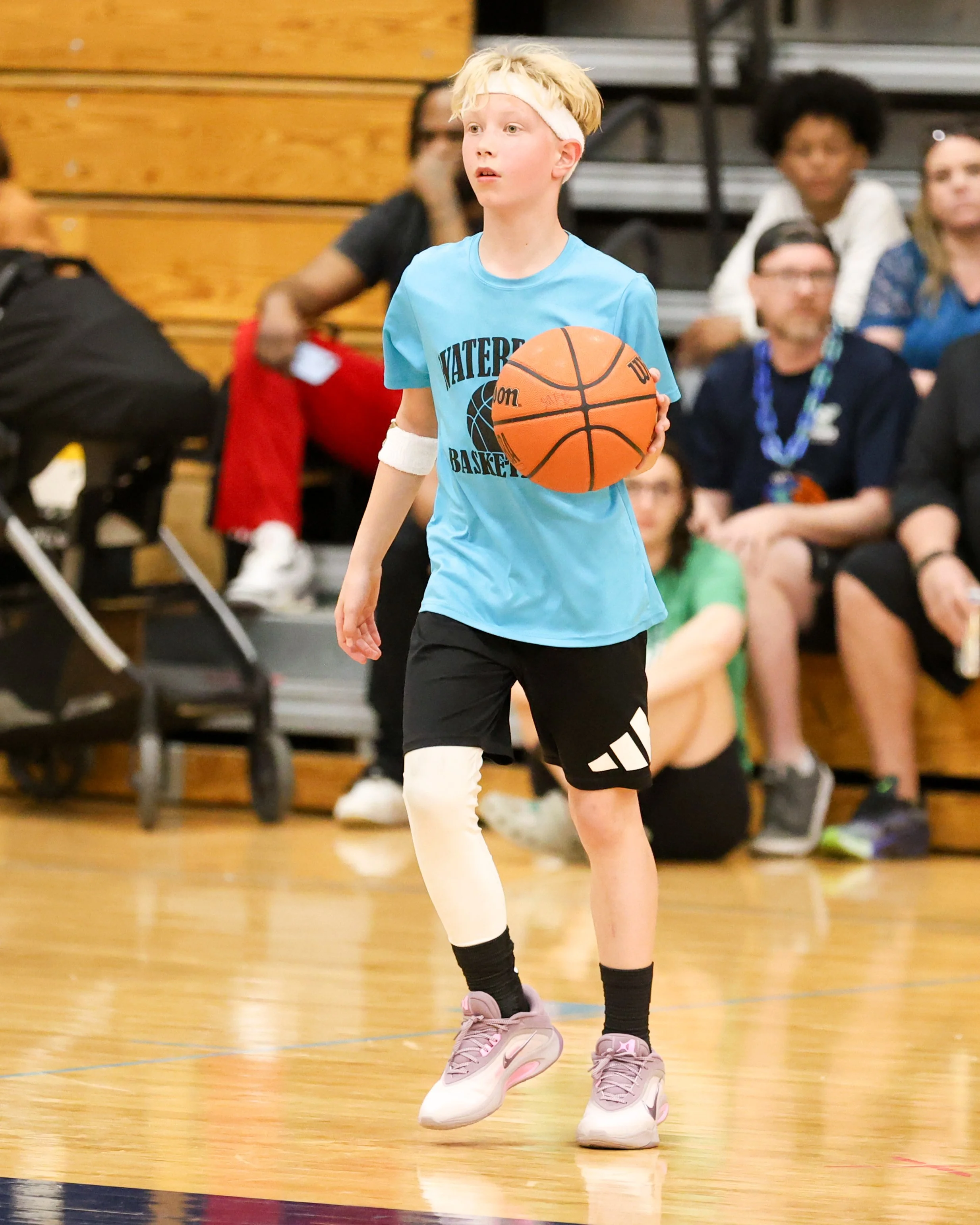 Cooley boy dribbles the ball