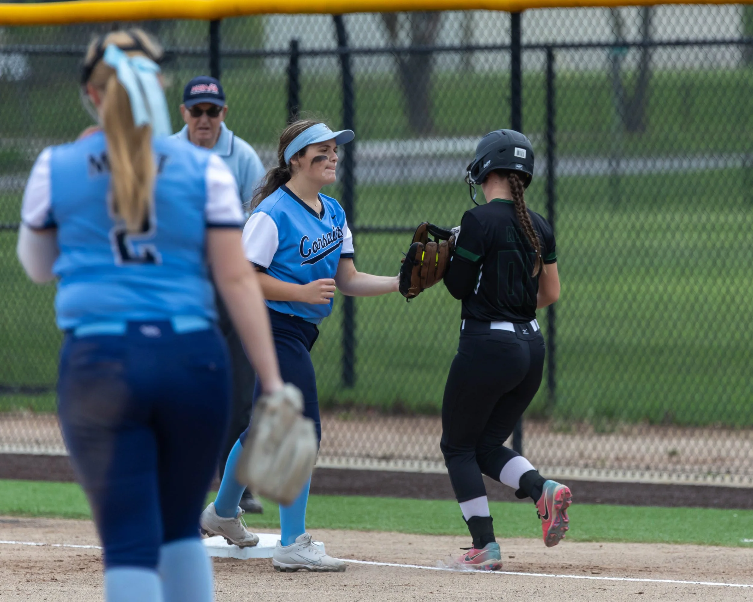 Mott first base takes out the runner