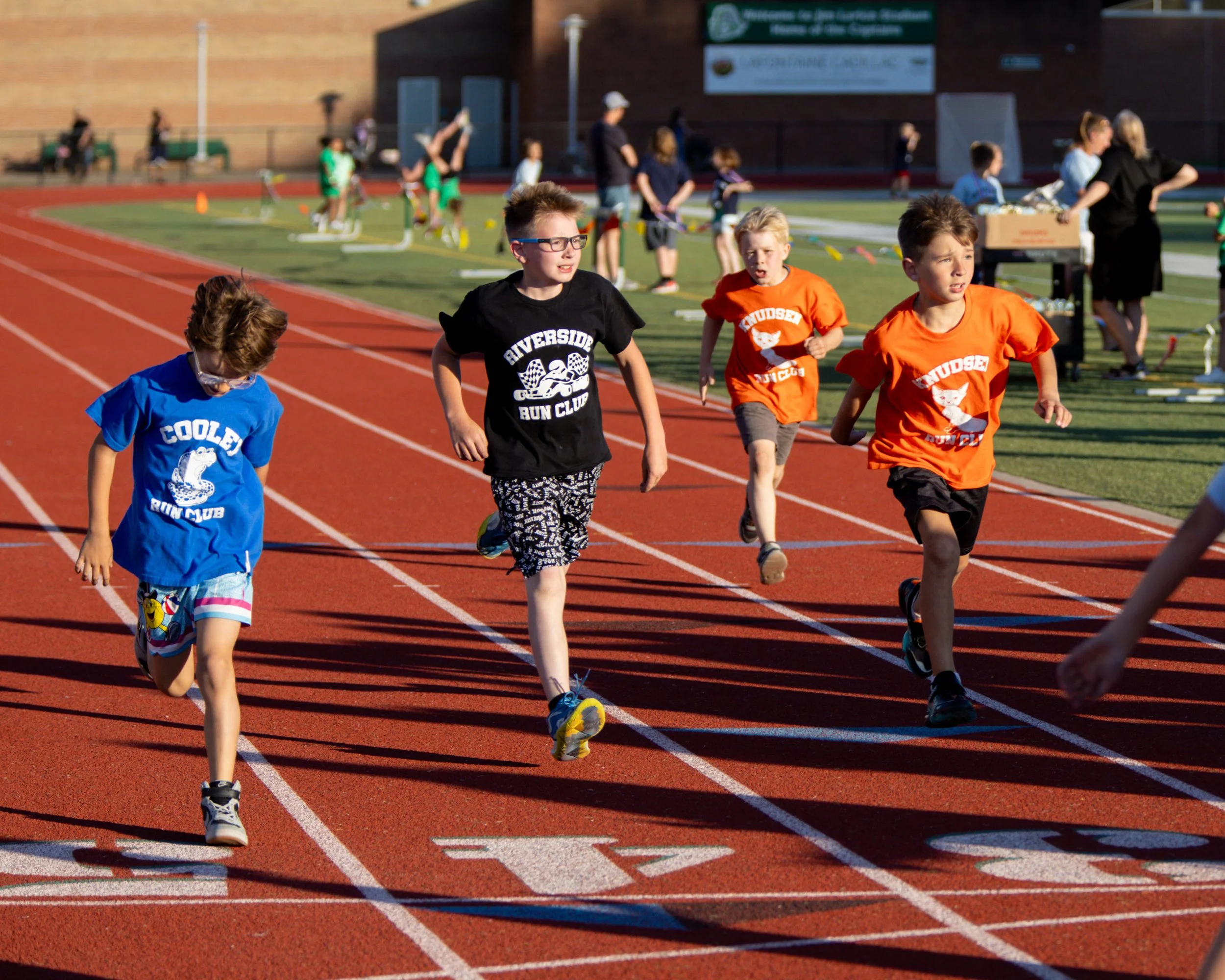 Cooley, Riverside and Knudsen runners at the finish line