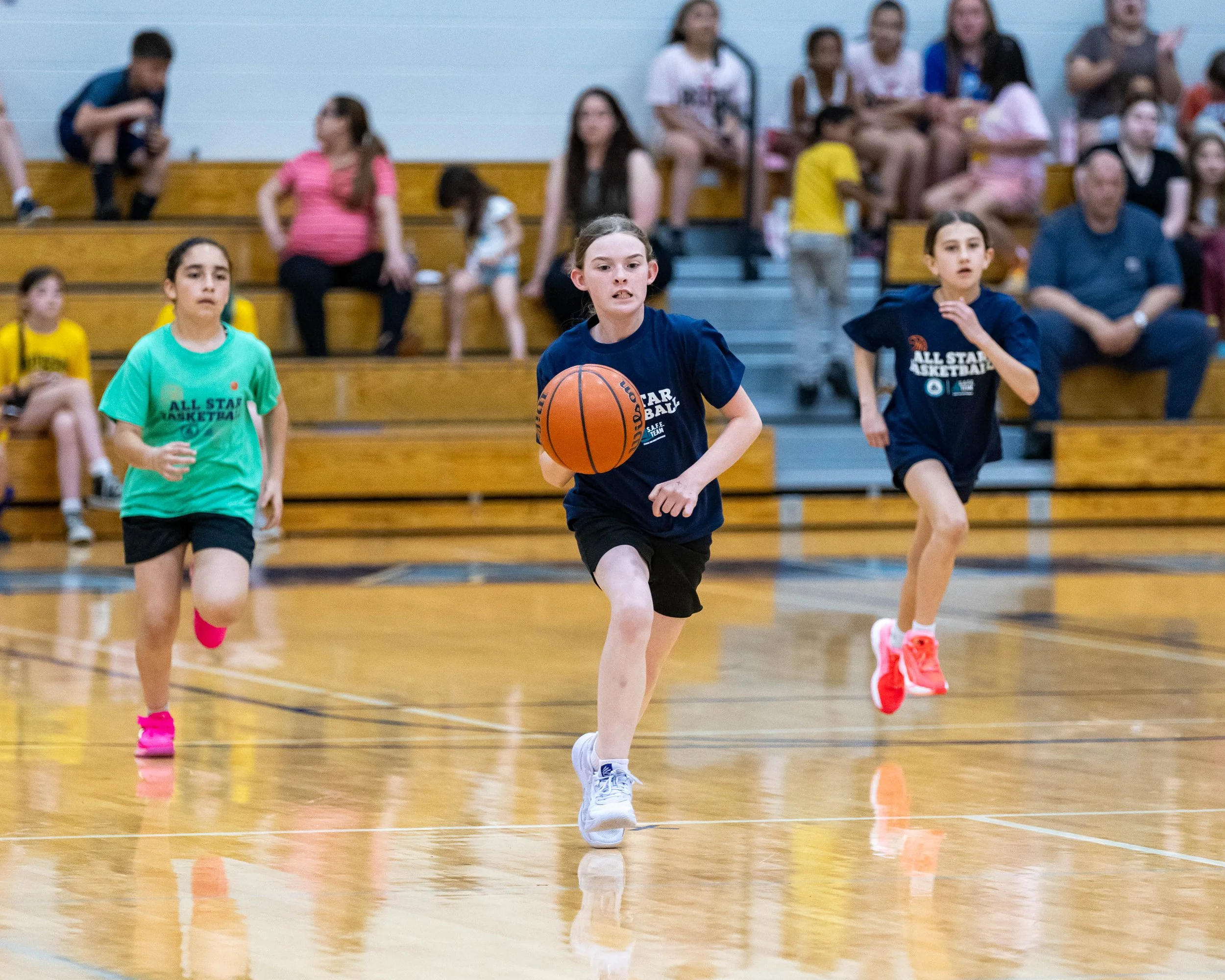 North girl dribbles them ball