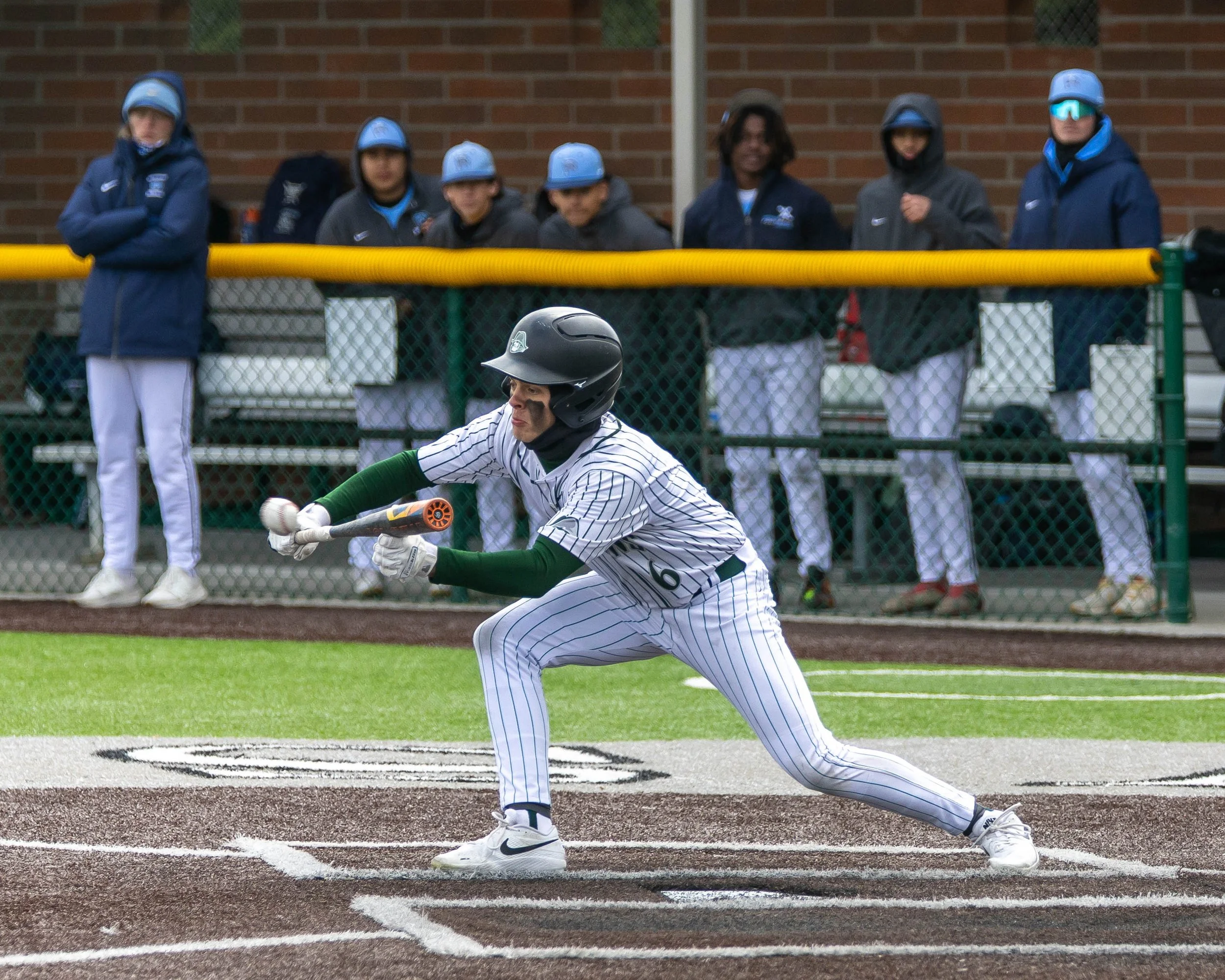 Kettering #6 bunts the ball