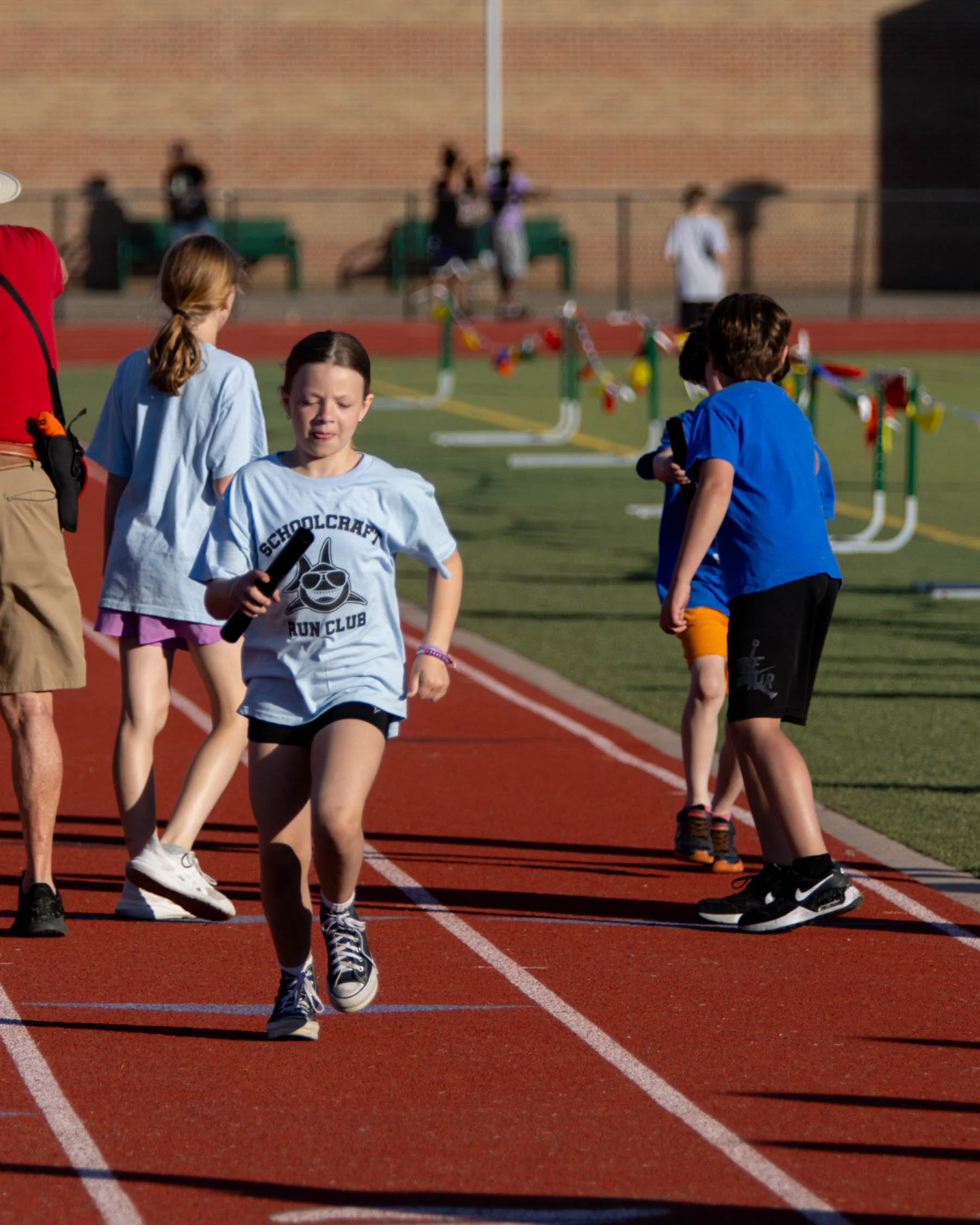 Schoolcraft runner after the exchange