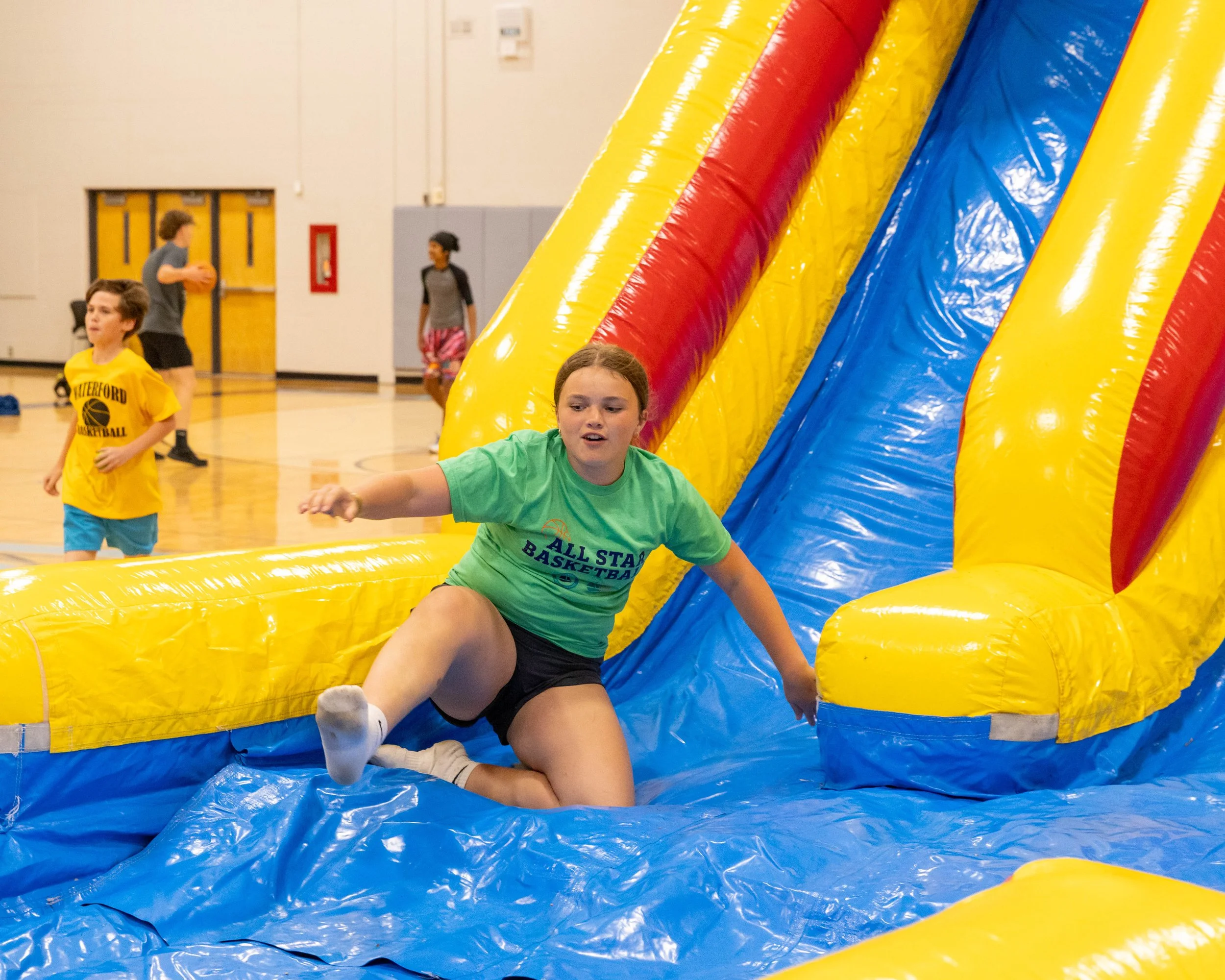 Girl at the bottom of the slide
