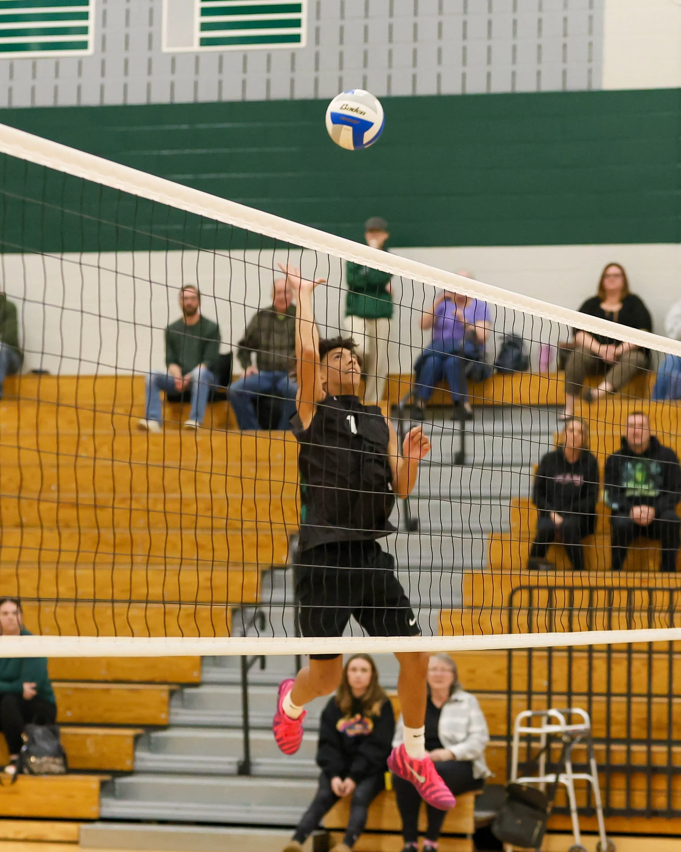 Kettering #1 up to block the ball