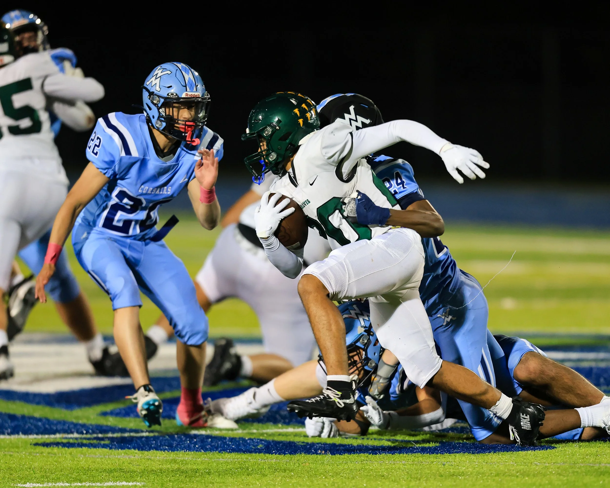 Mott #24 tackles the runner