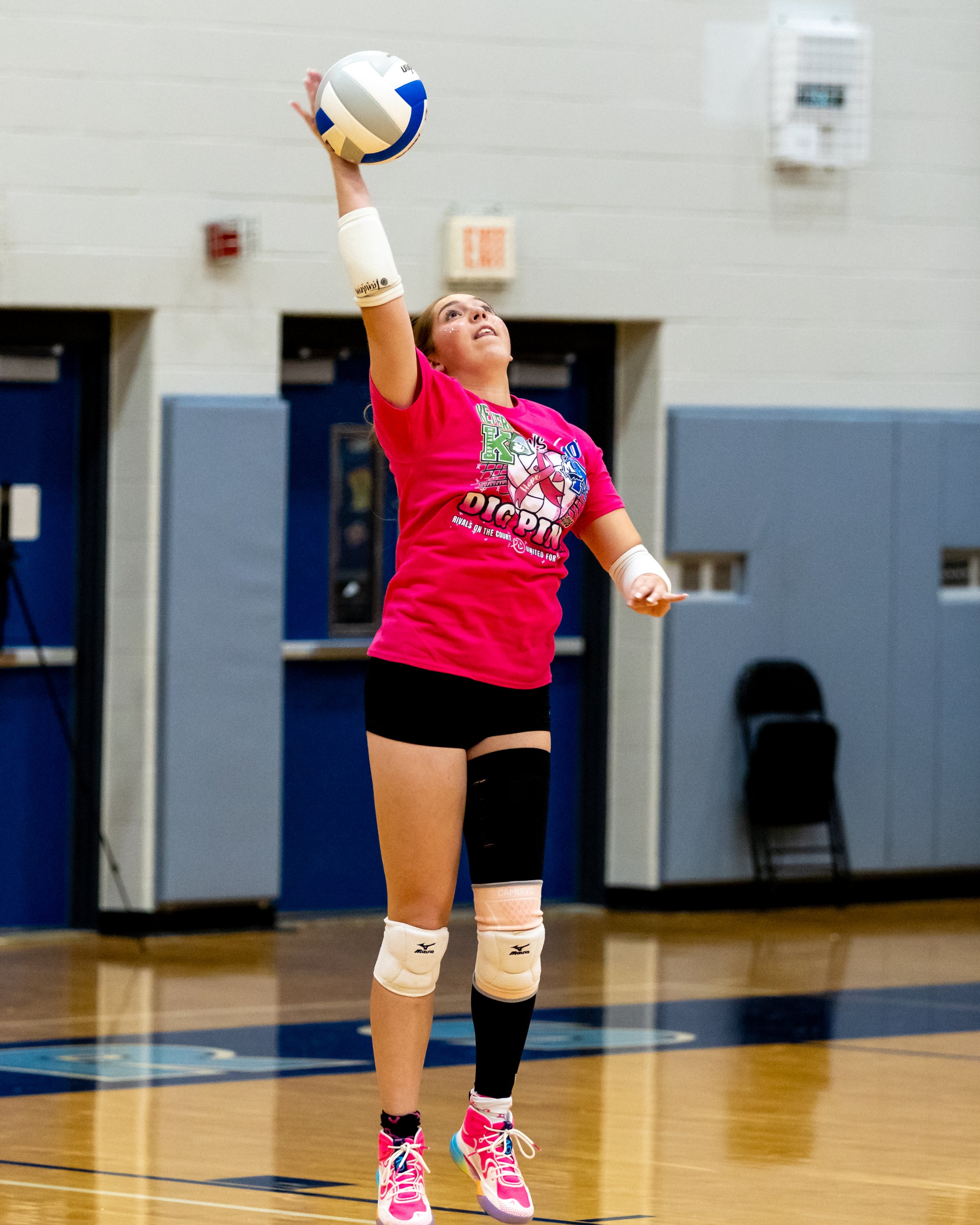 Kettering player hits the ball