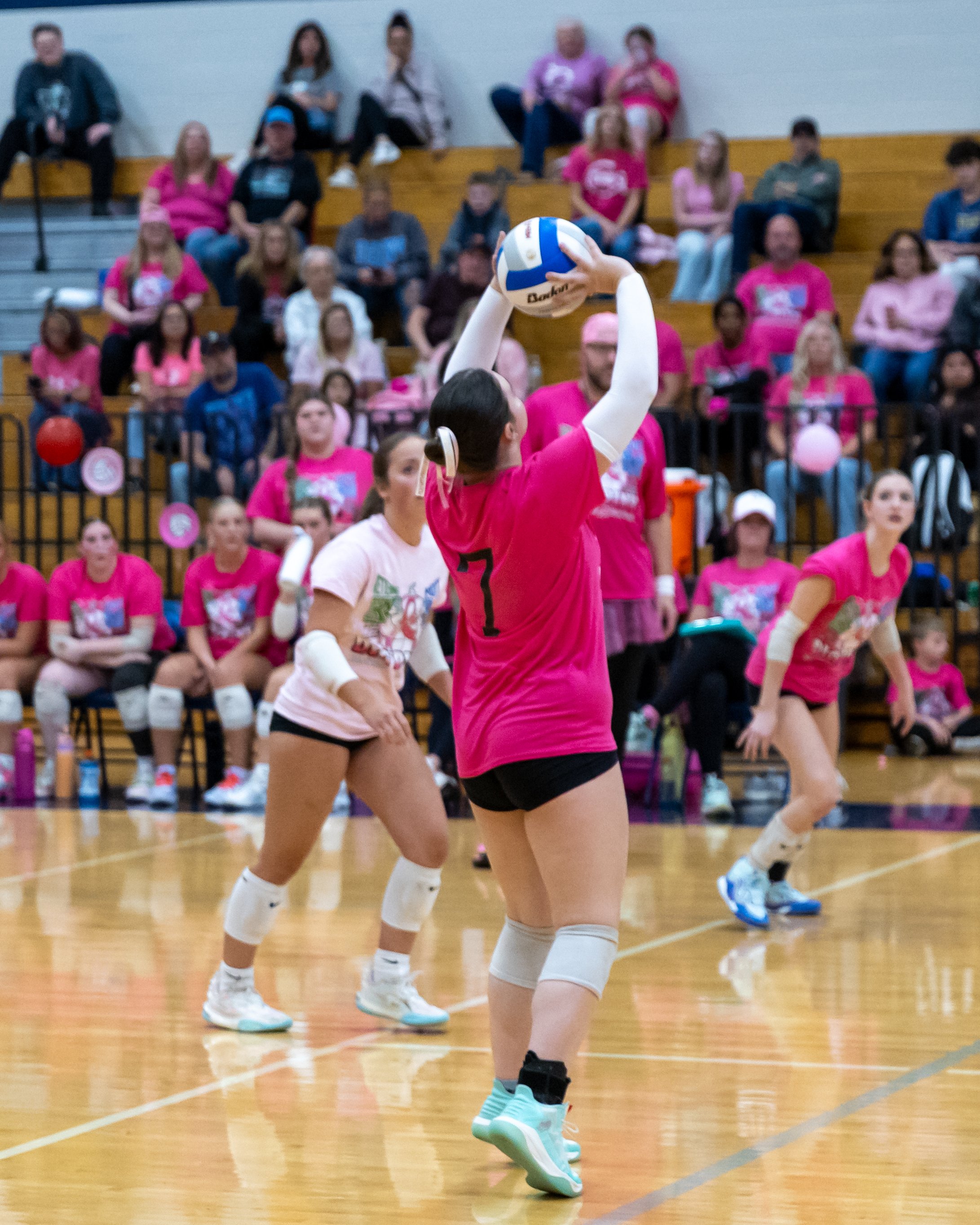 Kettering player sets the ball