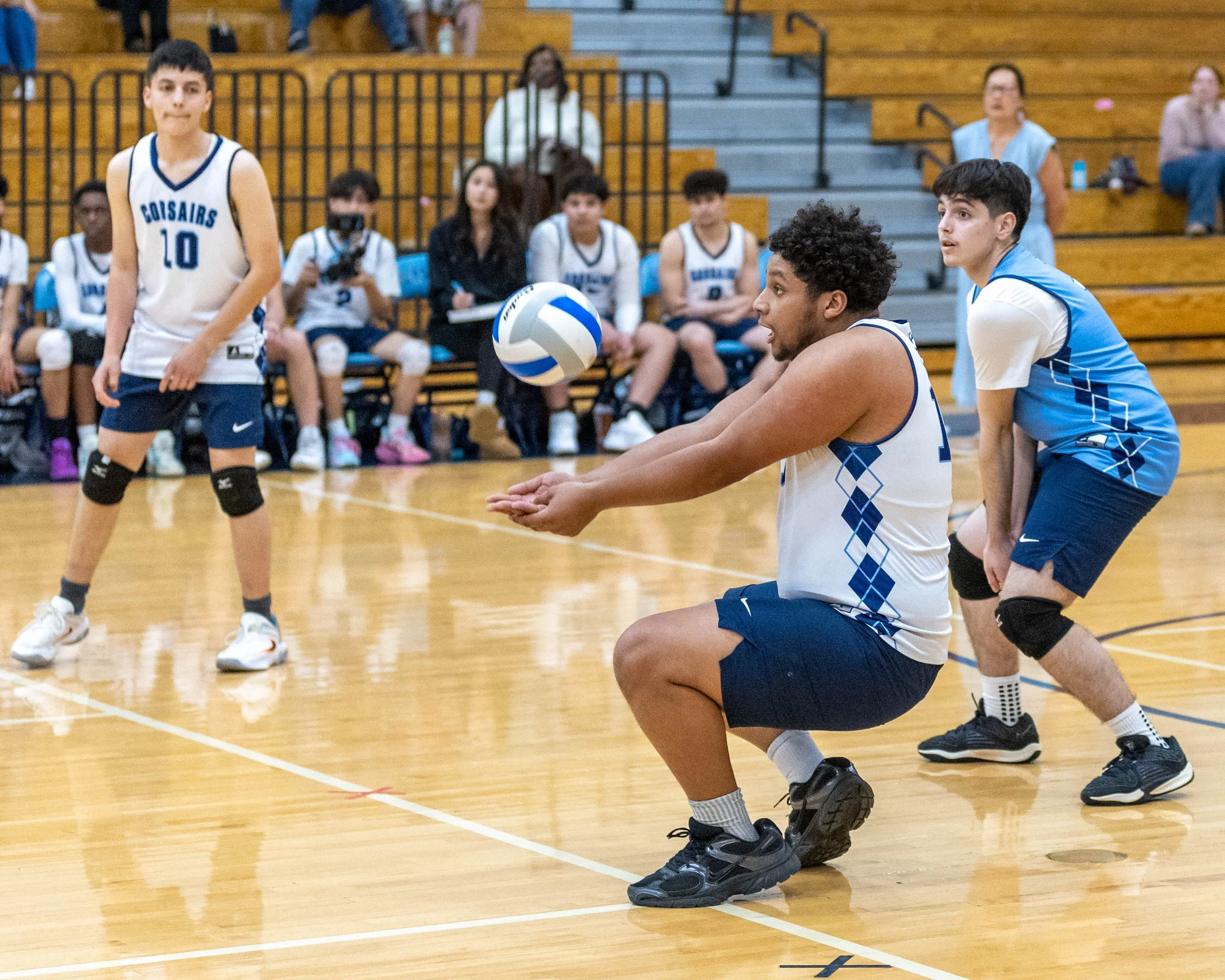 #13 hits the ball 