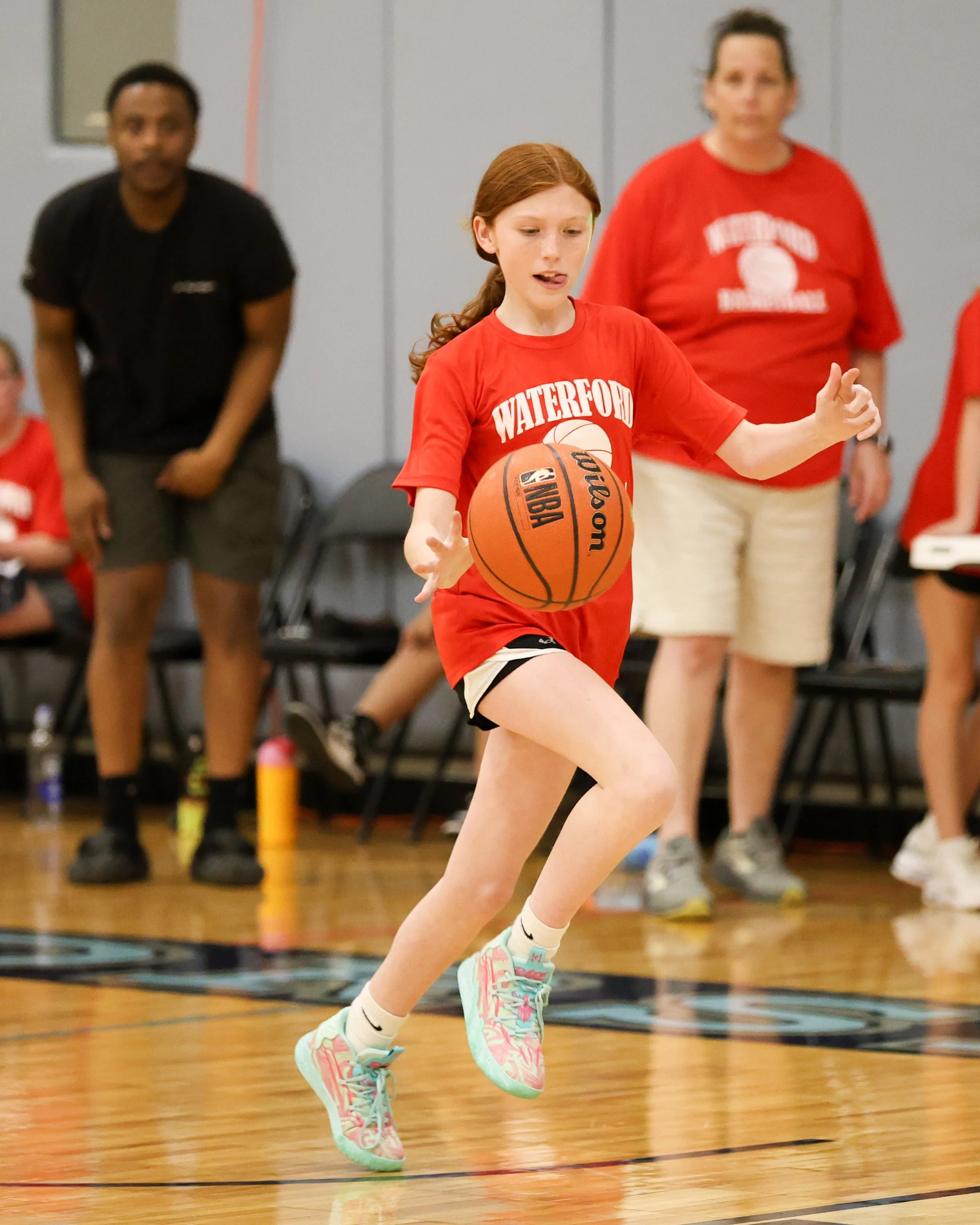 Houghton girl dribbles the ball