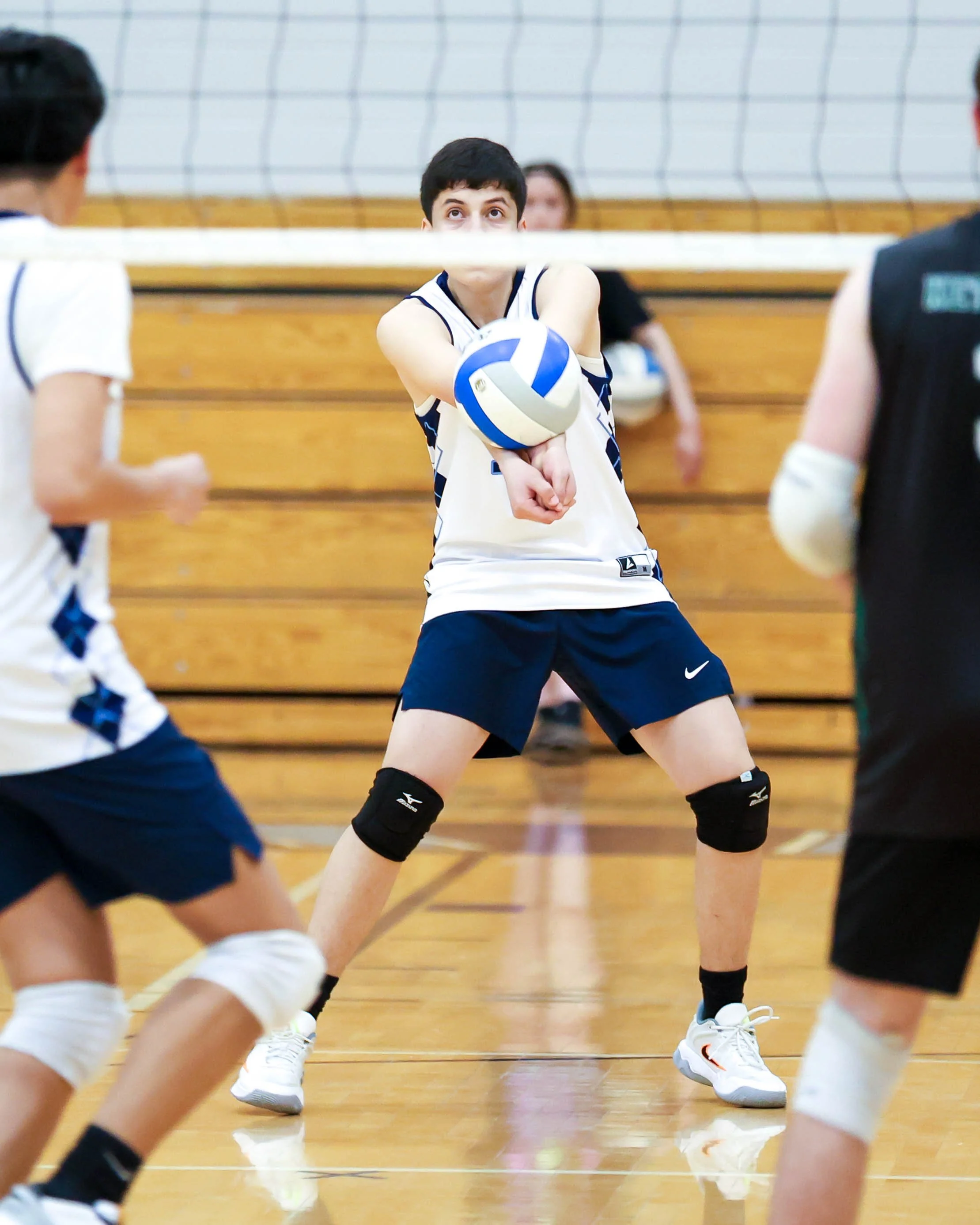 Mott #10 returns the ball