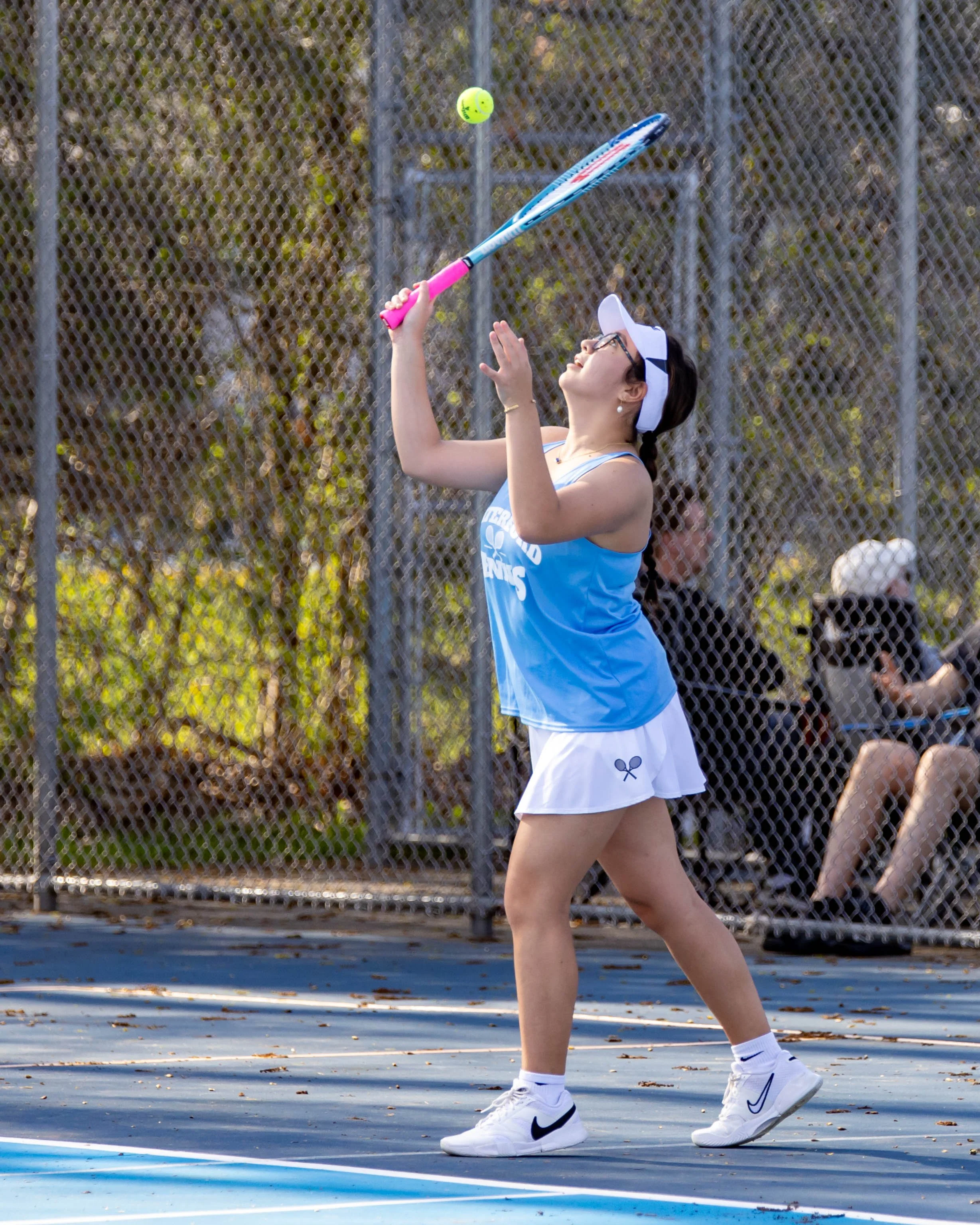 Waterford United player serves the ball