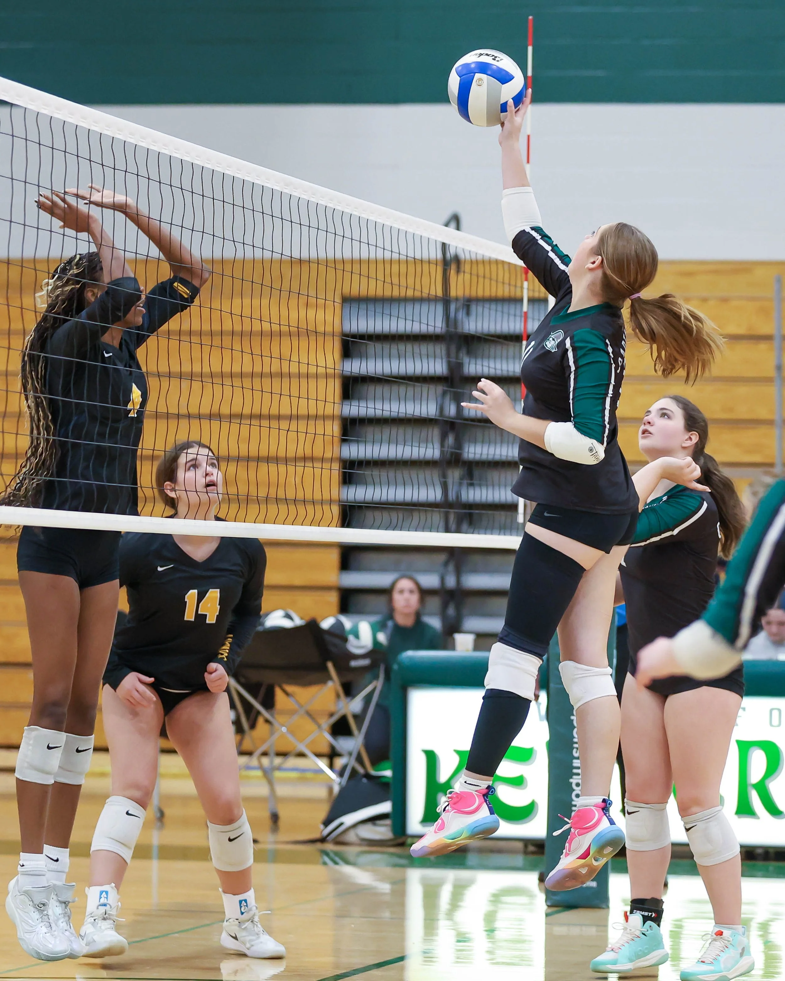 Kettering #11 hits the ball