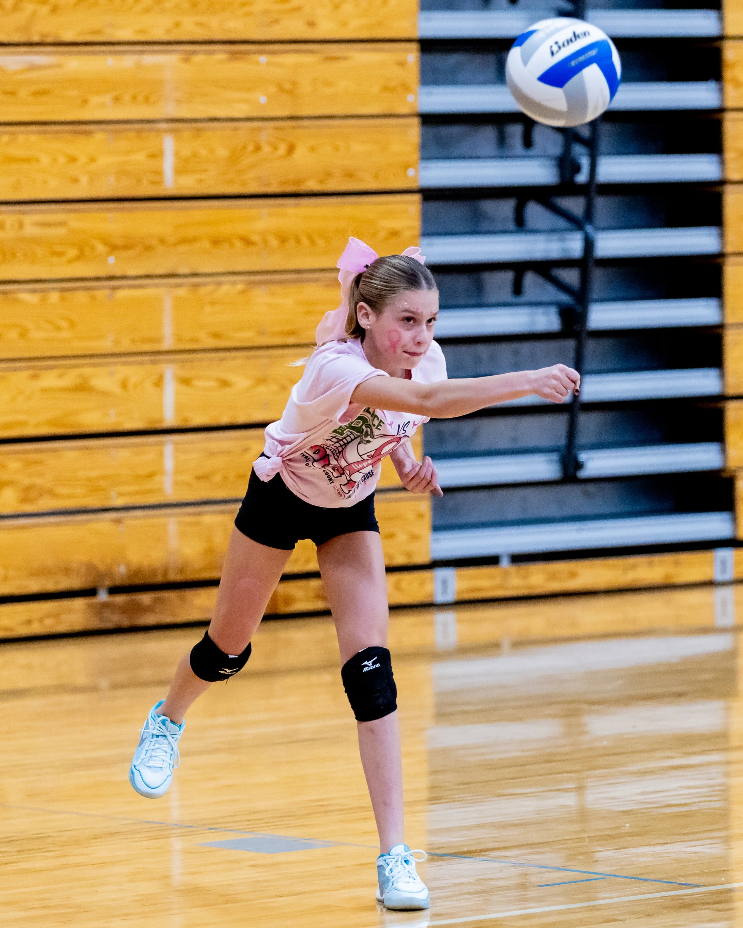 Mason player hits the ball