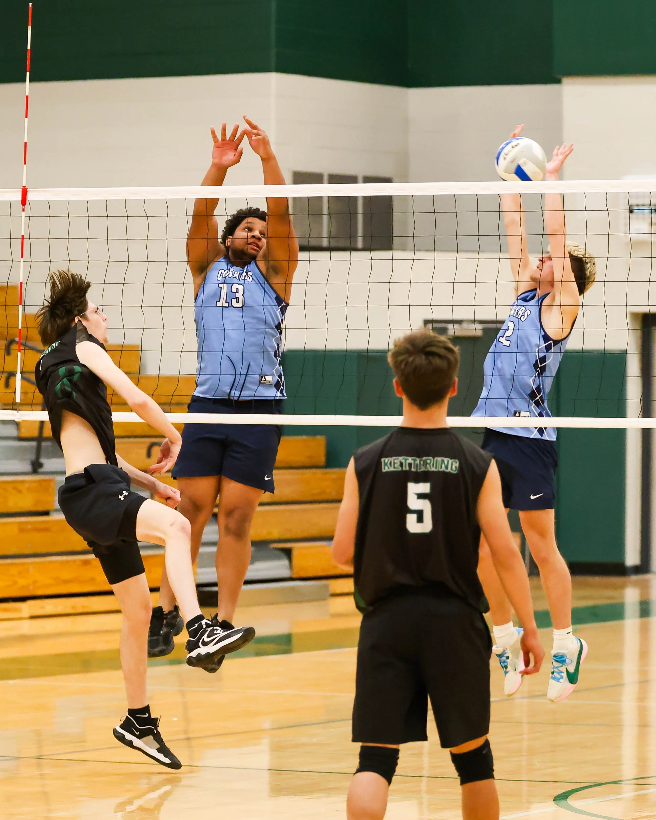 Mott #12 blocks the ball